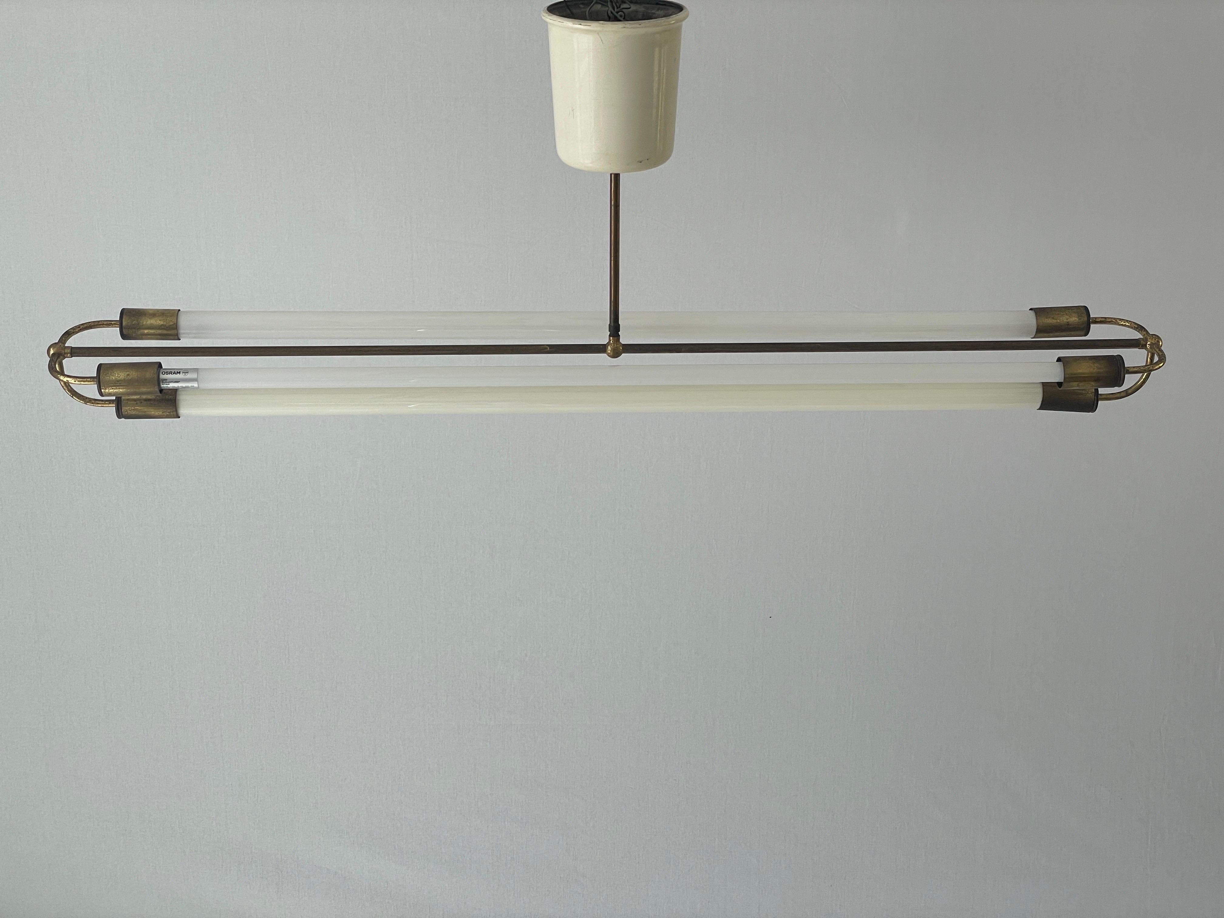 Art Deco Brass Industrial Ceiling Lamp by Kaiser & Co. with 3 fluorescent tubes, 1930s, Germany

Industrial ceiling lamp with 3 fluorescent Tubes

Note: There're 3 different type of fluorescent bulbs on the lamp

Lampshade is in very good vintage