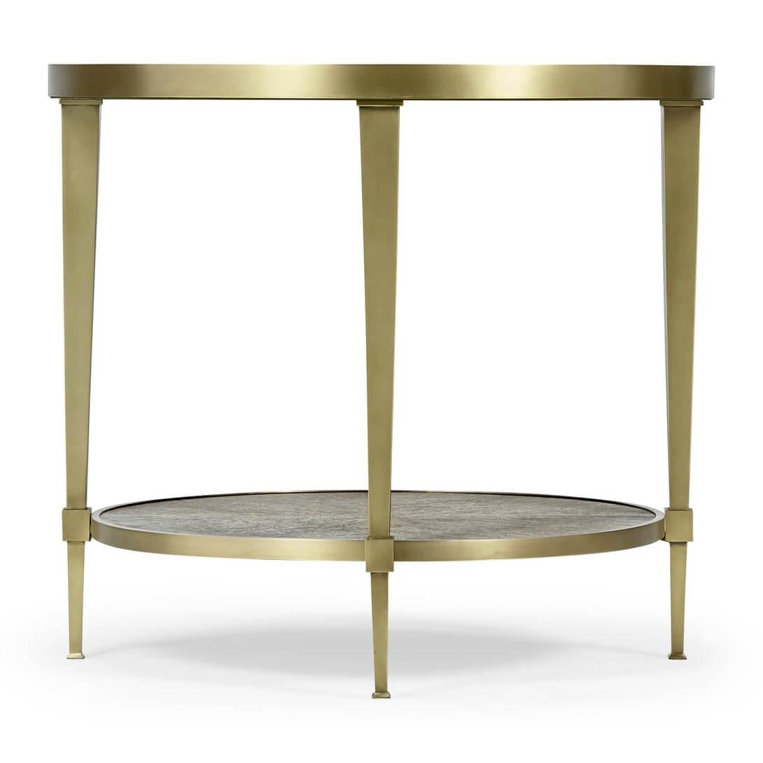 An Art Deco inspired brass and quartered dark oak two-tier lamp table with brass edge and square tapered supports, with a lower shelf stretcher base.

Dimensions: 27