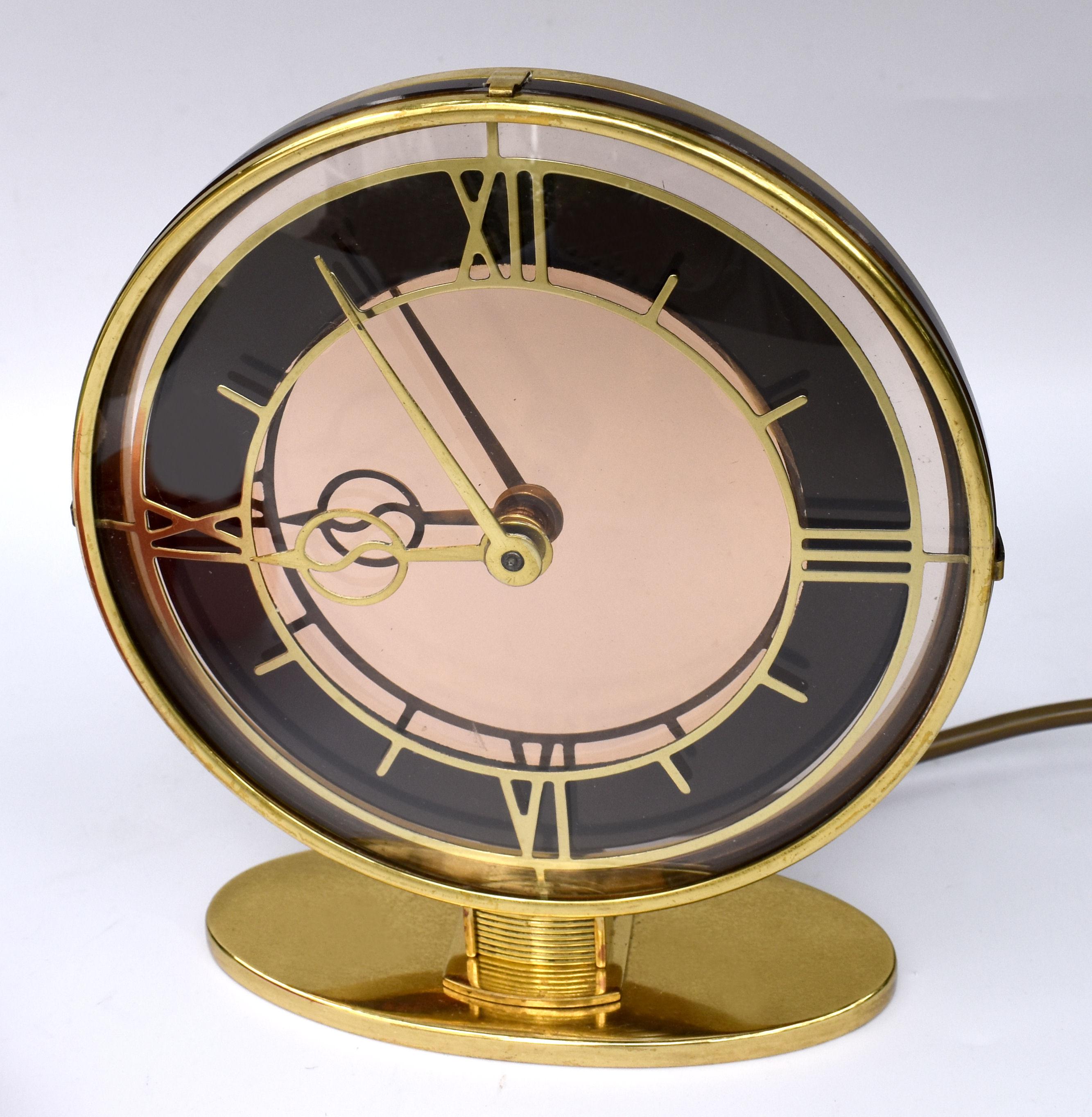 20ième siècle Horloge électrique Art déco en laiton et miroir, Angleterre, vers 1930 en vente