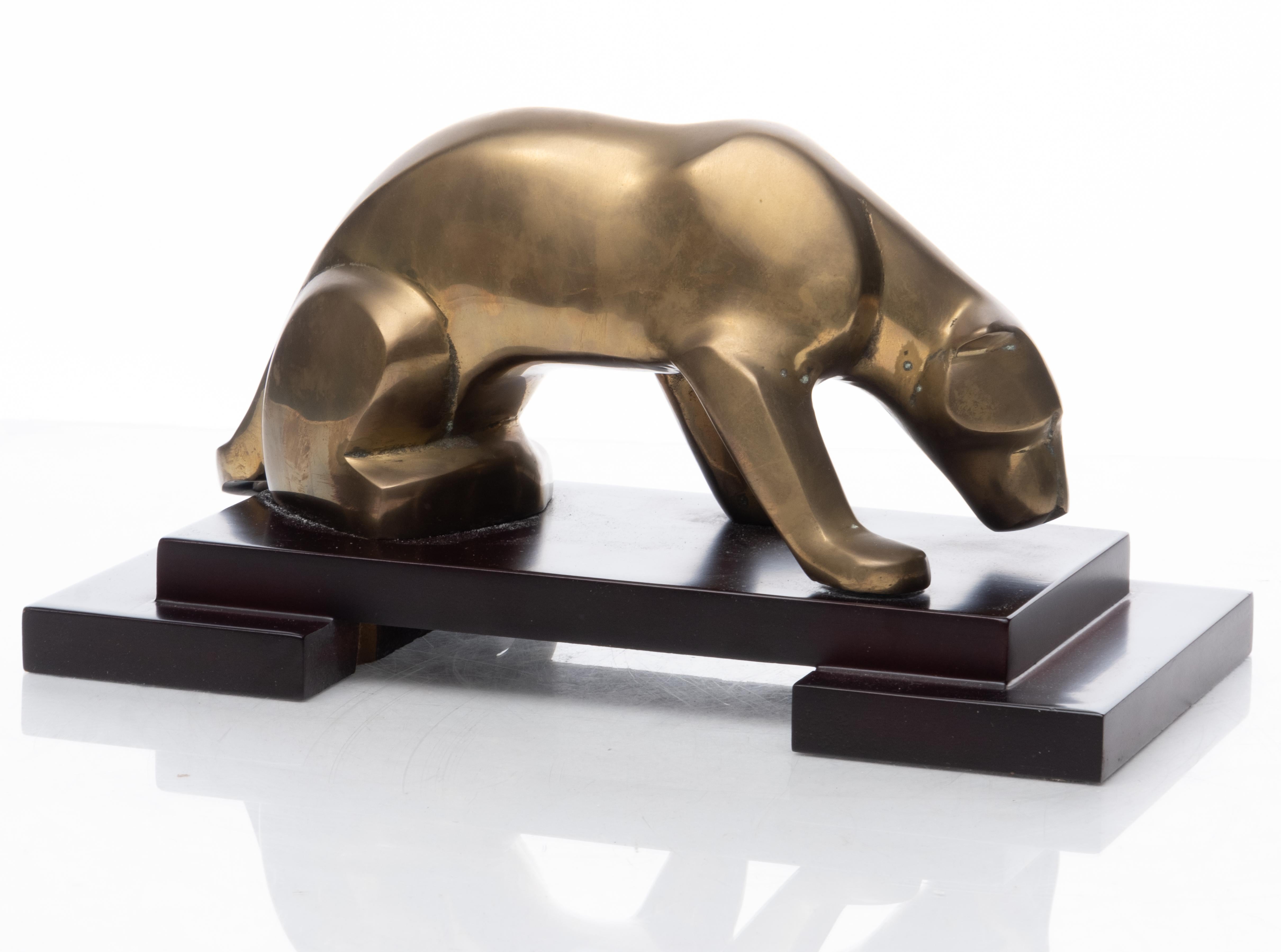 Modernist brass panther sculpture on lacquered wood stand, unsigned
