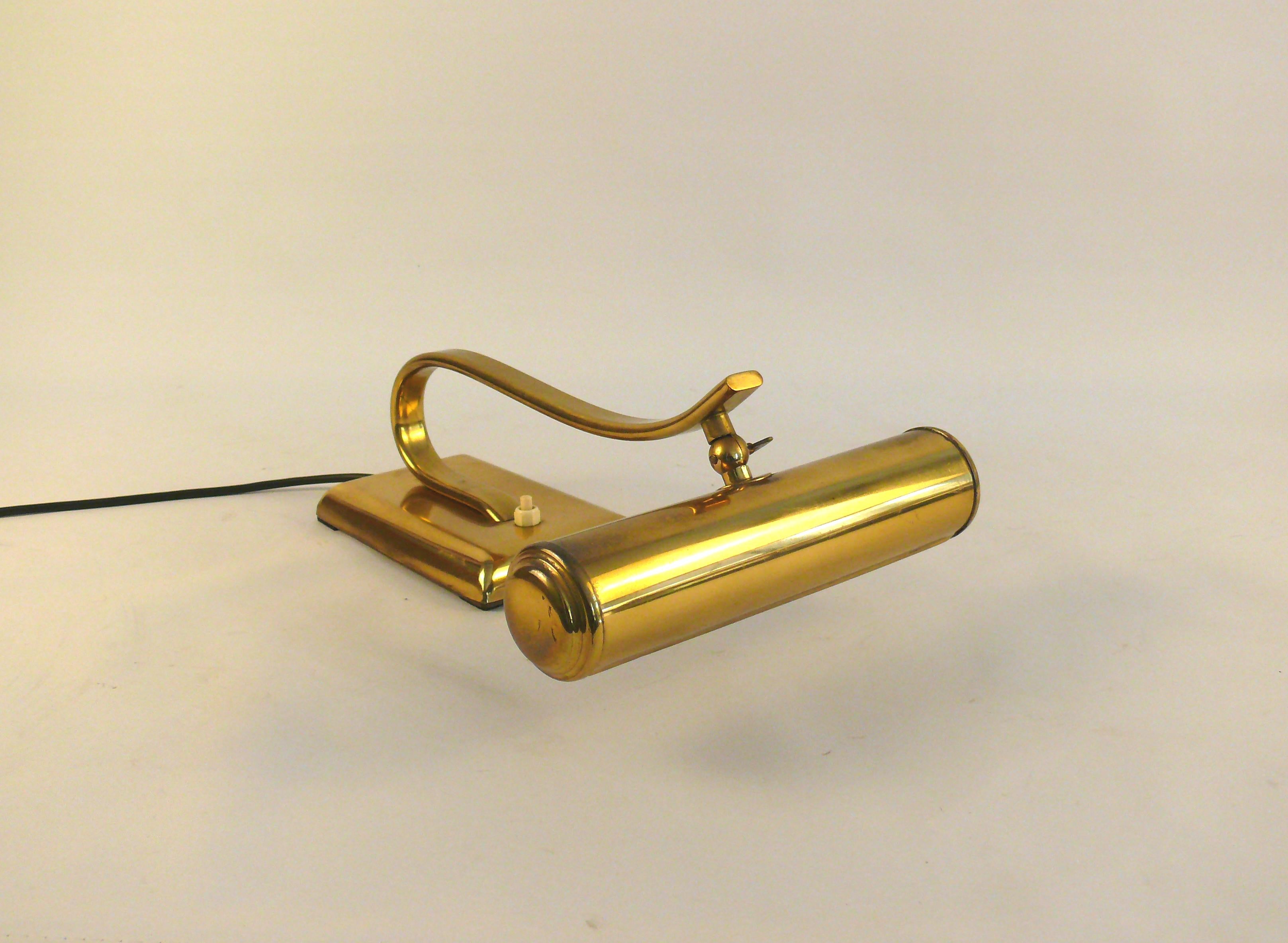 Art Deco piano lamp/table lamp from the 1930s - 1950s by the Heico company. The lamp is made of brass and metal. The screen can be tilted using a thumbscrew. The piano lamp has an E 14 socket made of brass - socket holder and socket may not be