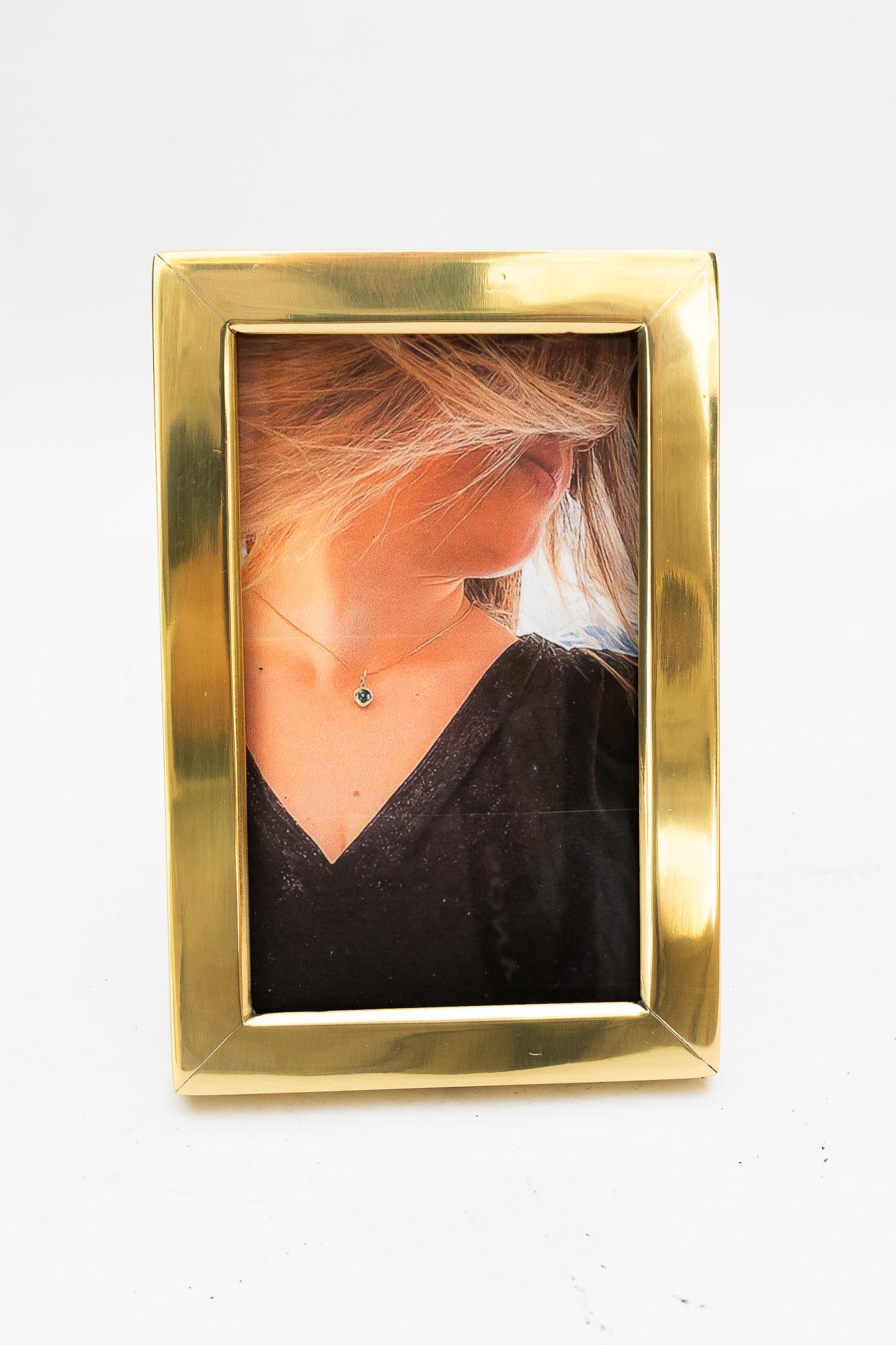 Art Deco brass picture frame vienna around 1920s
Glass in front of the picture
Brass polished and stove enameled
Max picture size: H: 14cm  W: 9,2cm