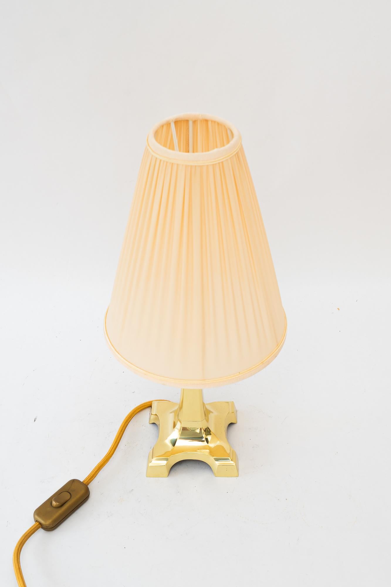 Art Deco brass table lamp with fabric shade vienna around 1920s
Brass polished and stove enameled
The Fabric shade is replaced ( new )