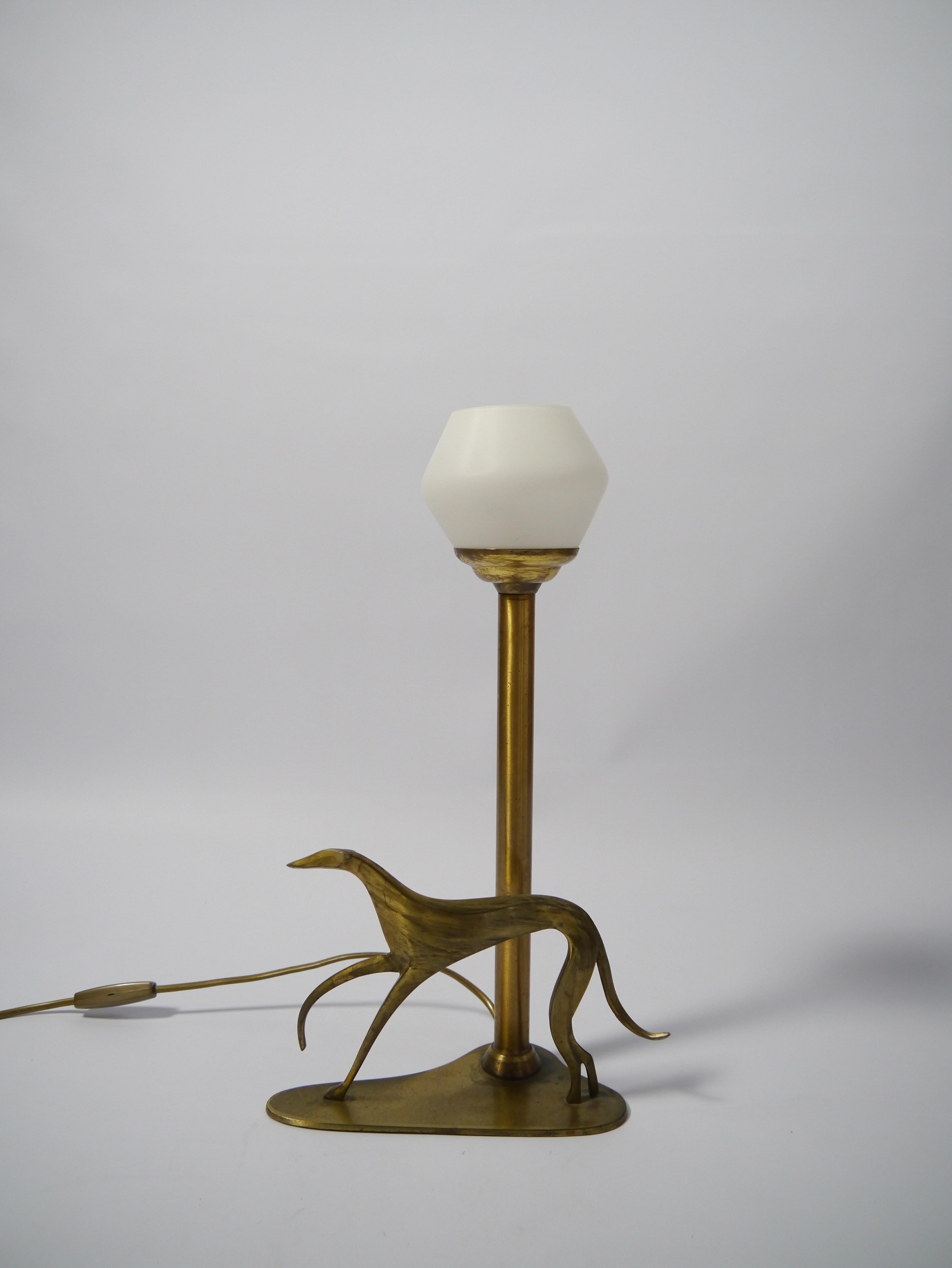 Art Deco 1940s brass table lamp with Greyhound figure, lampshade of opaline glass.