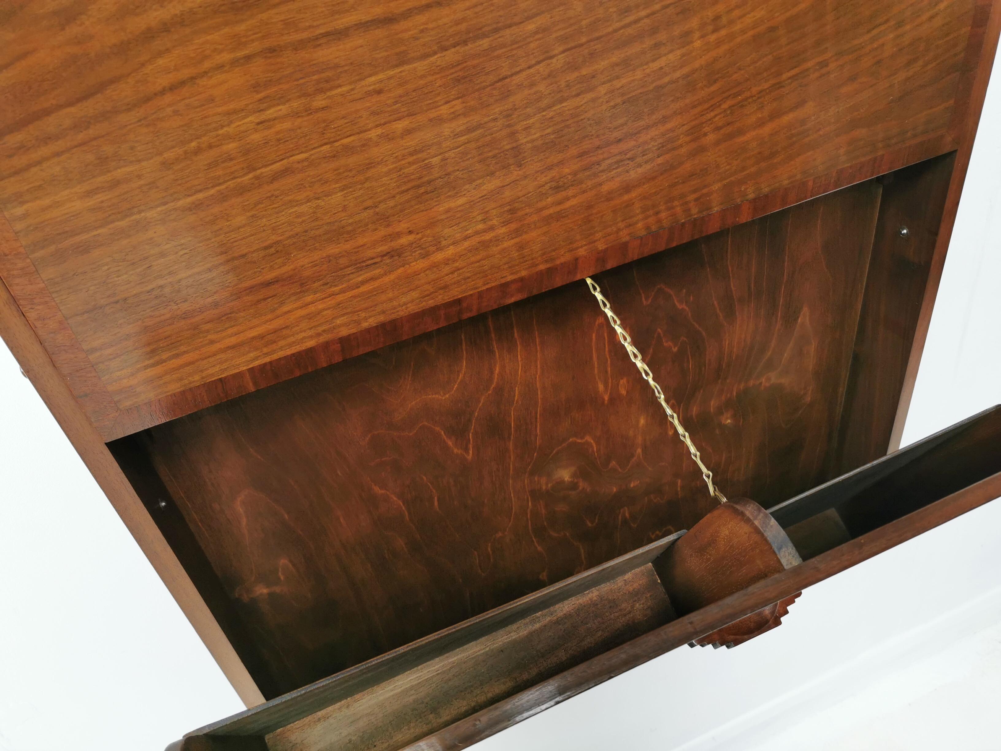 1930s wall desk

This Art Deco, 1930s mahogany compact desk by the Rowley Gallery has a drop-down desk over a hinged folio. Comes complete with original pigeon holes for storage. The desk can be wall-mounted to suit your own space and height