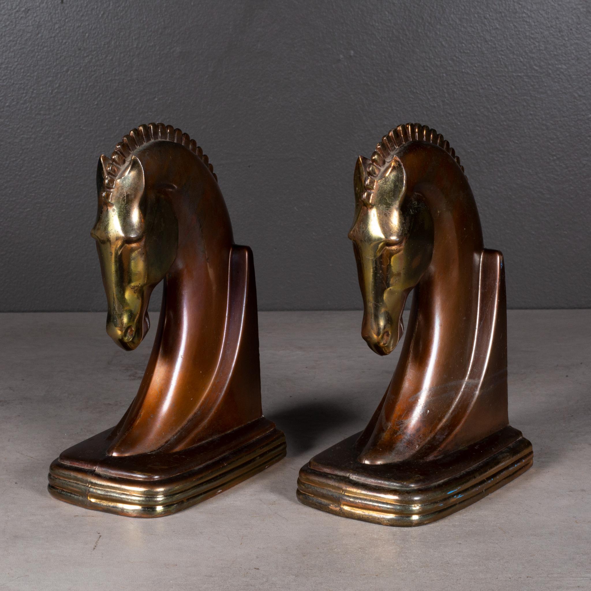 ABOUT

An original pair of Art Deco Trojan horse bookends manufactured by Dodge Trophy Inc. Los Angeles California USA. Both pieces have retained their original bronze and copper finish and are in good condition with appropriate patina for their