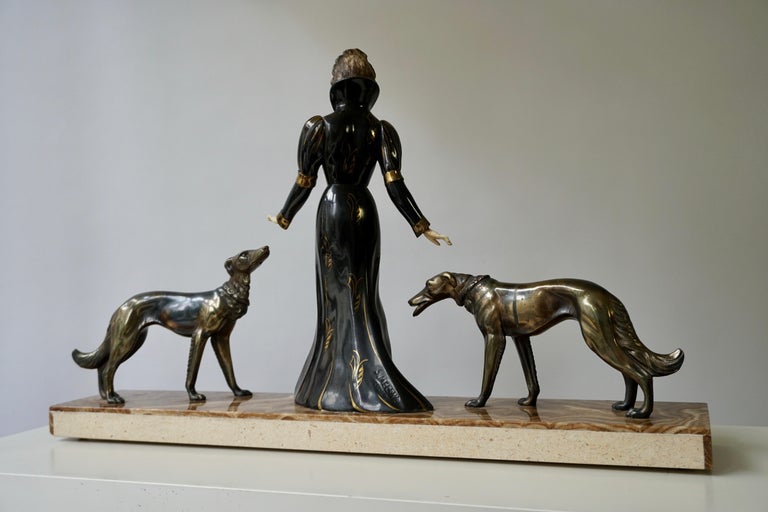 Art Deco Bronze and Marble Sculpture of a Woman with Greyhounds Signed S Melani In Good Condition In Antwerp, BE