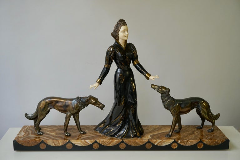 Metal Art Deco Bronze and Marble Sculpture of a Woman with Greyhounds Signed S Melani