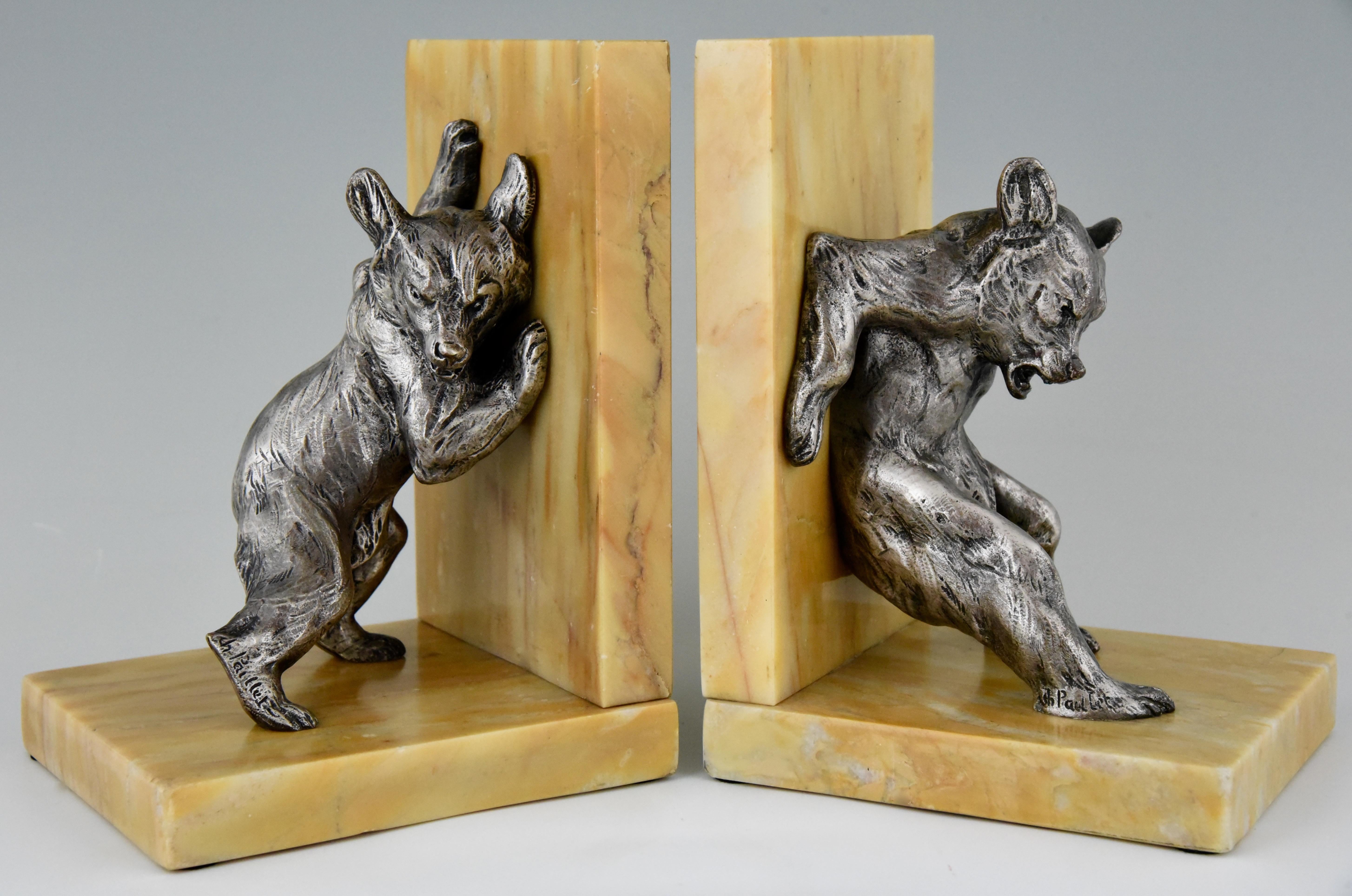 Lovely pair of Art Deco bronze bookends with bear cubs playing.
Signed by artist Charles Paillet. Mounted on beautiful yellow marbles bases, France, circa 1920.