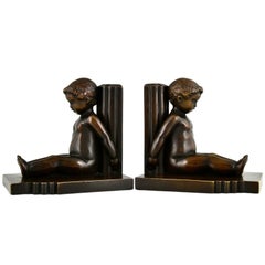 Art Deco Bronze Buchstützen Kinder Paul Silvestre und Susse Frères Frankreich 1920