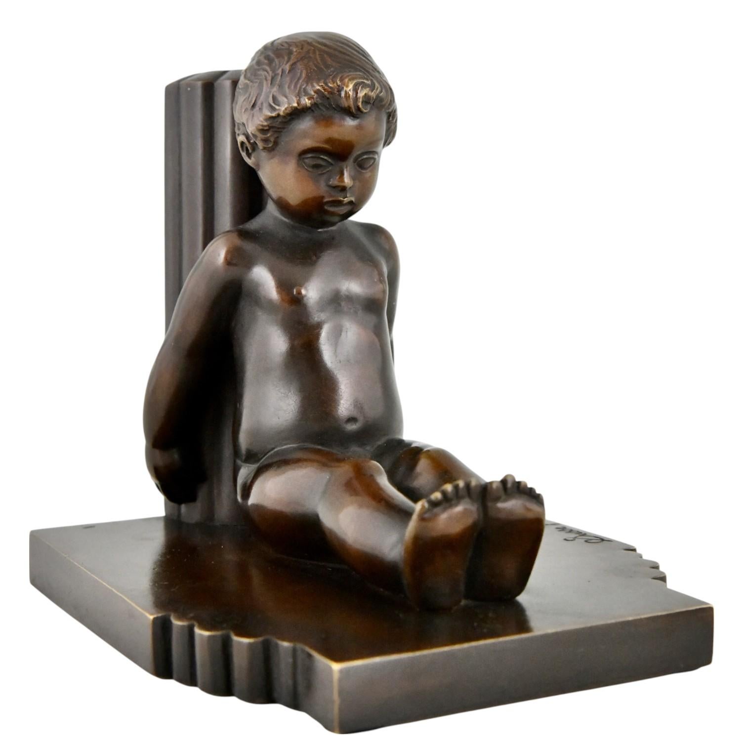 Bronzo Reggilibri in bronzo Art Déco bambini Paul Silvestre e Susse Frères Francia 1920 in vendita