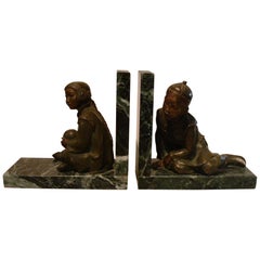 Art Deco Bronze Bookends of Chinese Children Playing by M. White, England, 1920