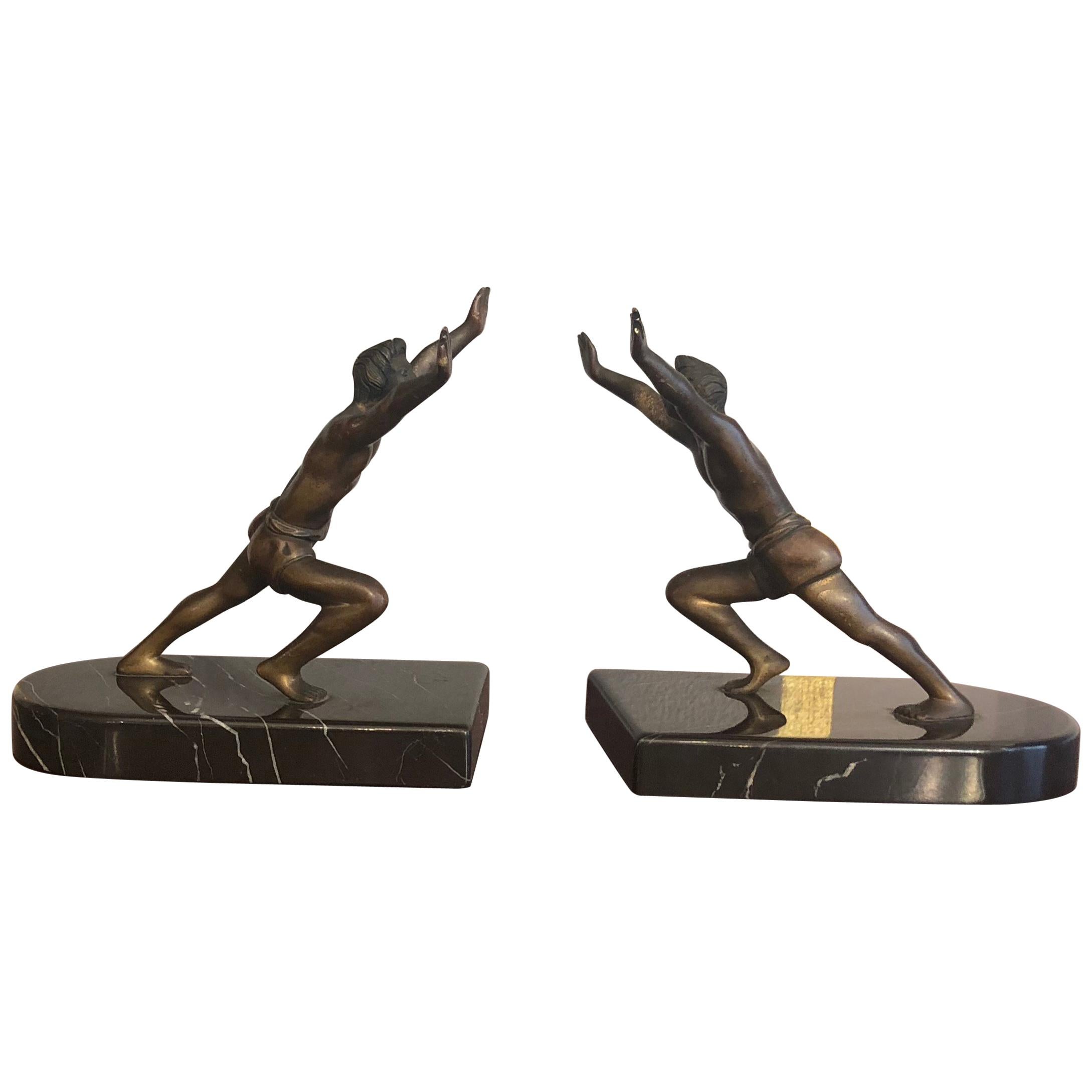 Art Deco bronze book holders with marble bases. Very detailed and finely made little bronze sculptures.
Size of each:
High 13 cm
wide 15 cm
deep 10 cm
Ideal as Christmas or wedding present.

 