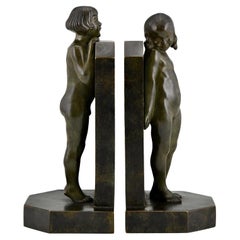 Art Deco bronze bookends with children by Raoul Benard with foundry mark, 1930