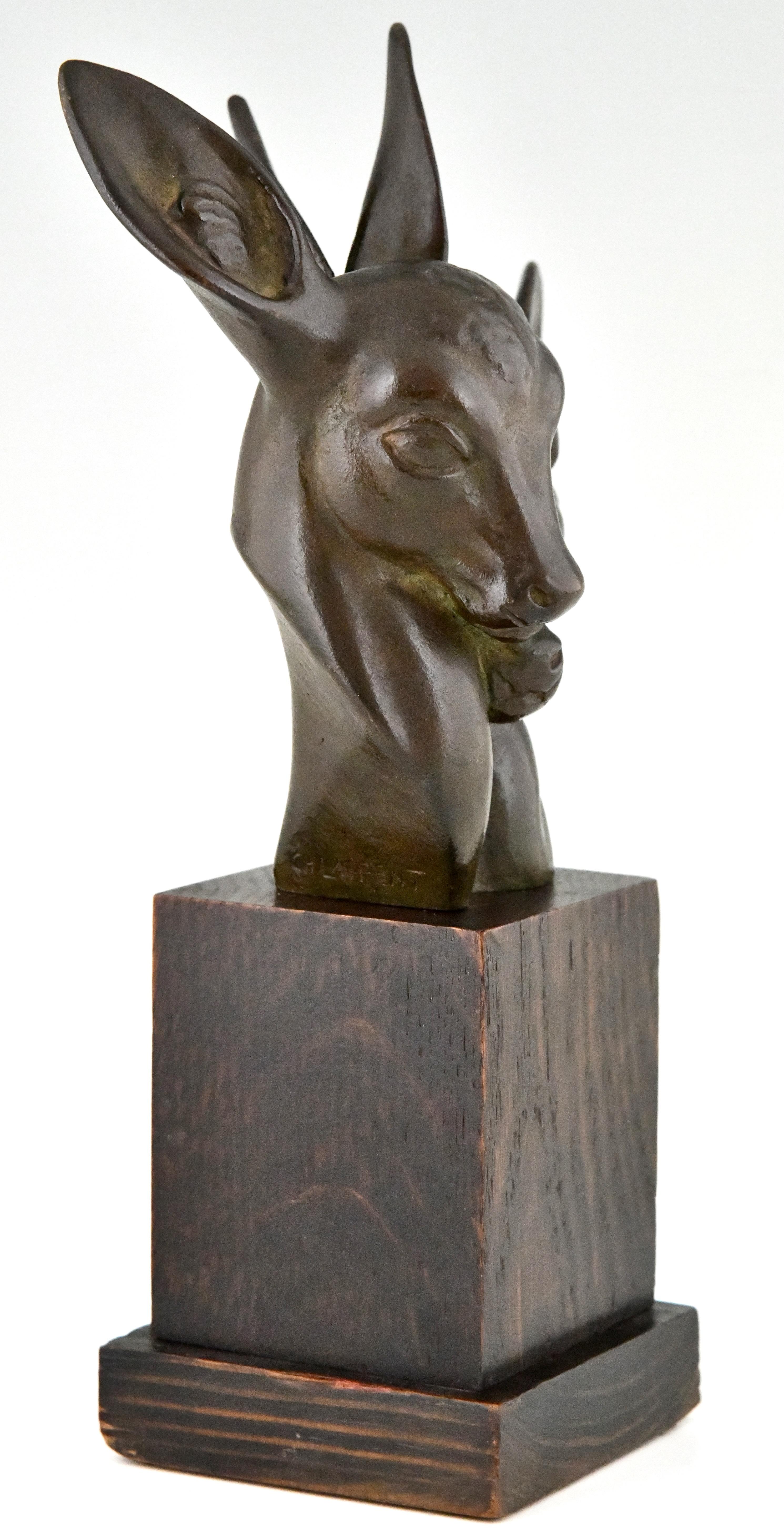 French Art Deco bronze bust of two deer signed by Georges H. Laurent France 1930 For Sale