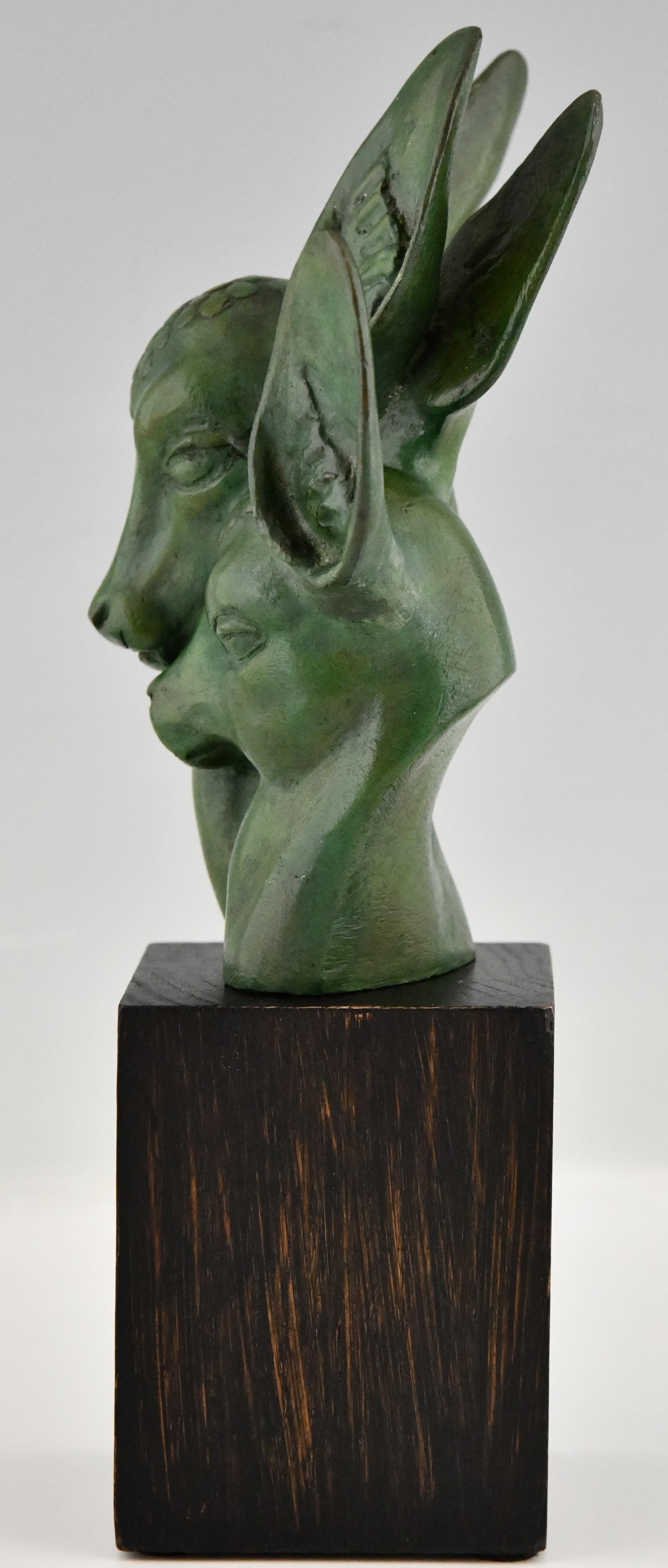 Patiné Buste de deux cerfs en bronze Art Déco signé par Georges H. Laurent France 1930