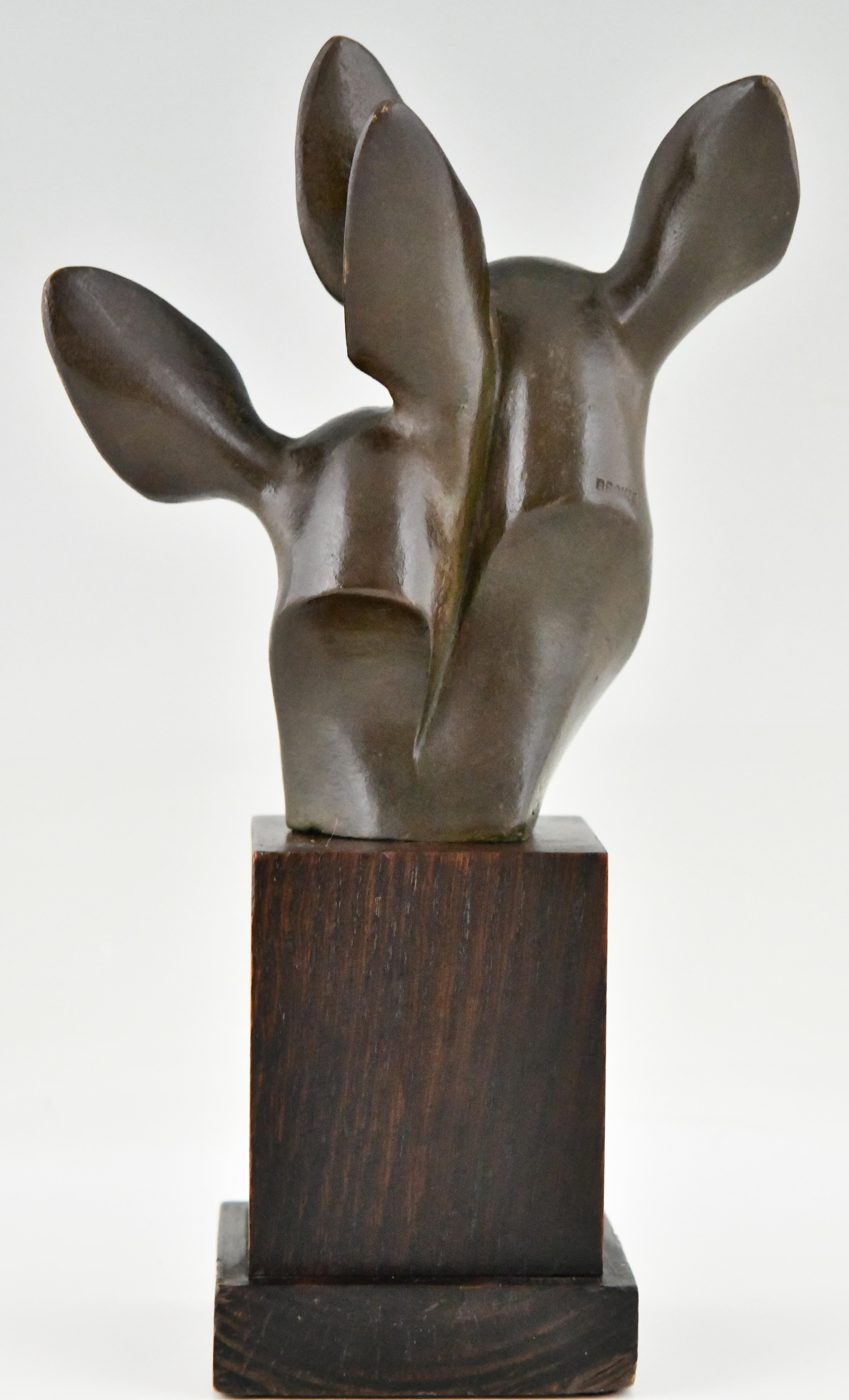 Patiné Buste de deux cerfs en bronze Art Déco signé par Georges H. Laurent France 1930 en vente
