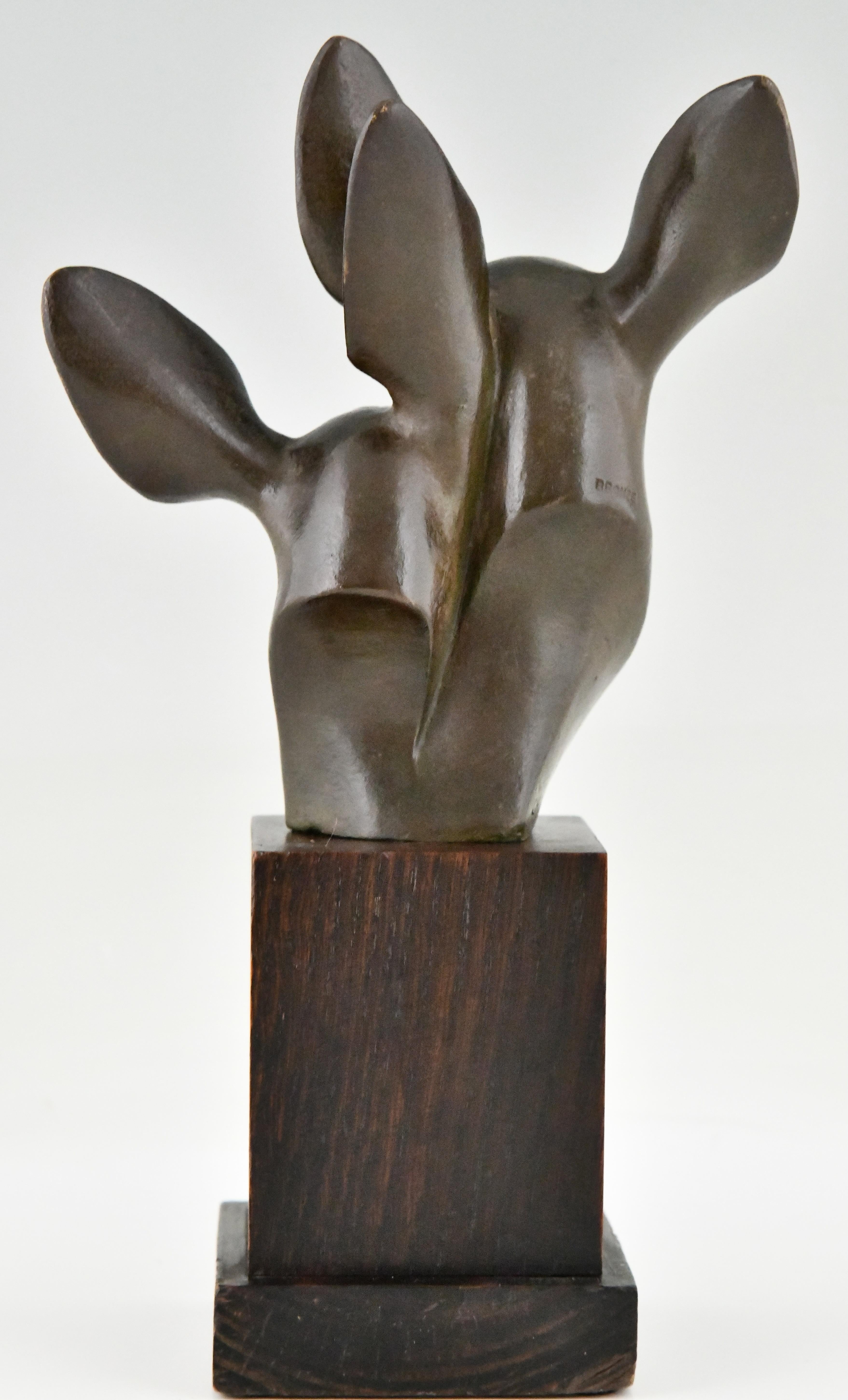 Patinato Busto in bronzo Art Deco di due cervi firmato da Georges H. Laurent Francia 1930 in vendita