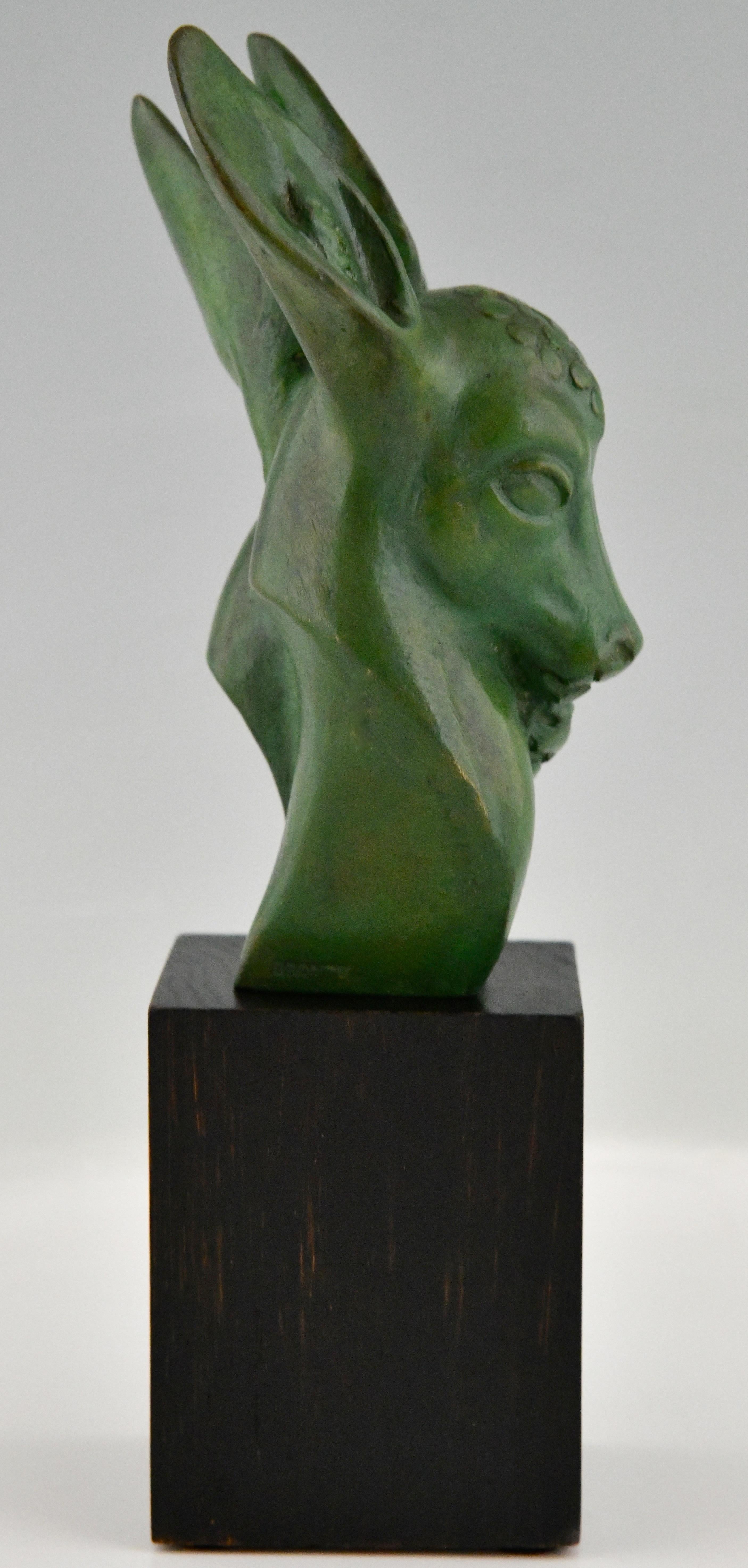 Milieu du XXe siècle Buste de deux cerfs en bronze Art Déco signé par Georges H. Laurent France 1930