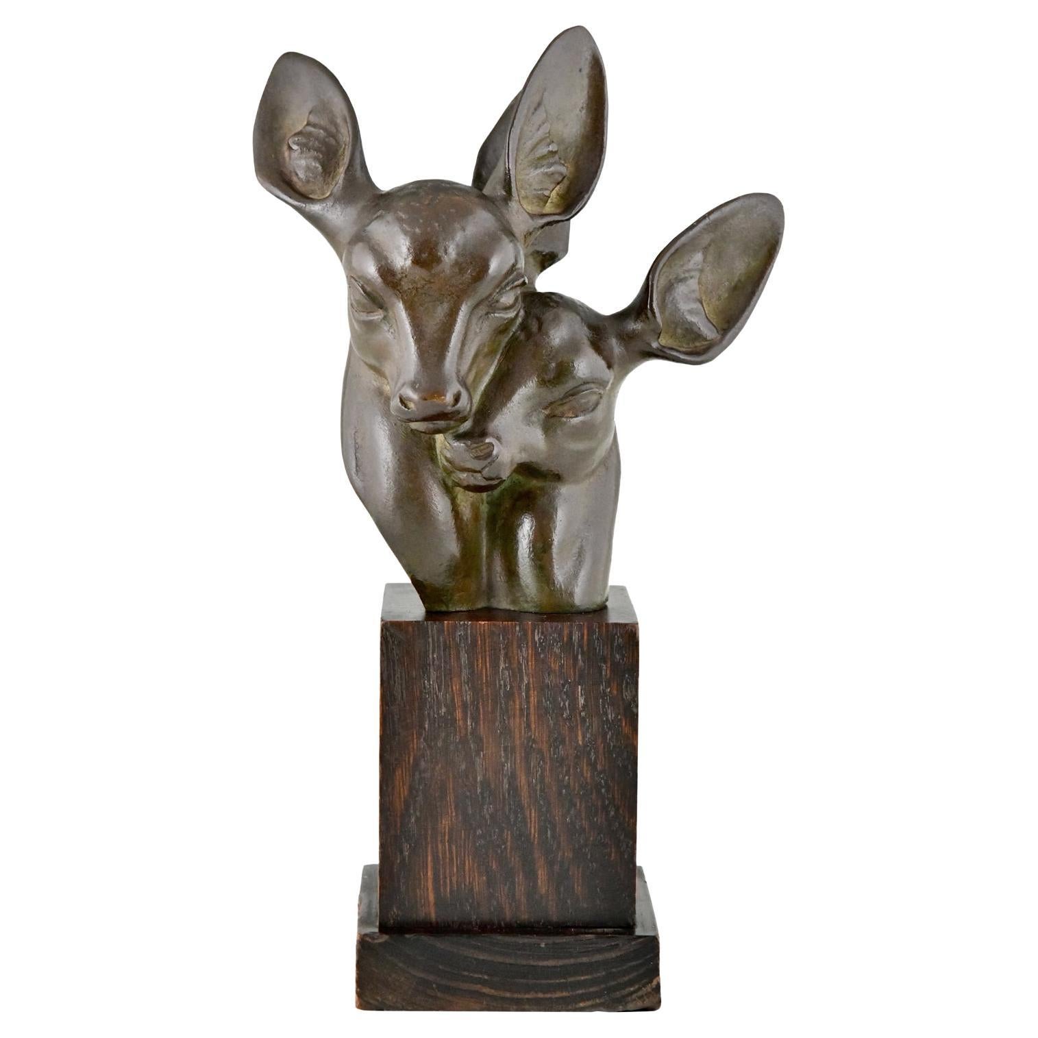 Art Deco bronze bust of two deer signed by Georges H. Laurent France 1930 For Sale