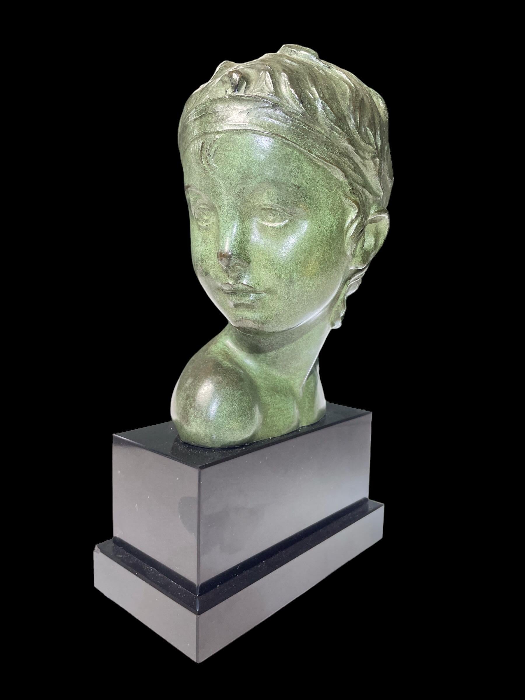Bronze bust of a youth beautifully modelled by the sculptor Alexandre Kéléty (1918 - 42) and raised on a black stepped rectangular plinth. The bronze marked ‘Bronze’ and ‘ Kélety’.
 
Alexandre Kéléty emigrated from Hungary to France at the end of