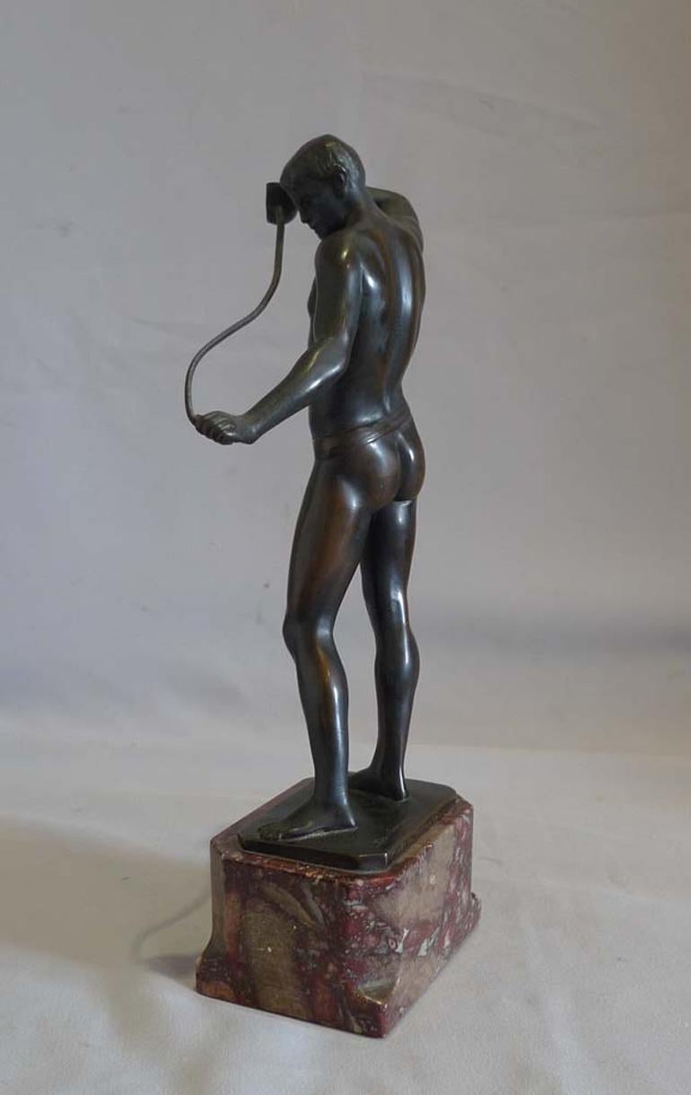 Mid-20th Century Art Deco bronze by Ludwif Eisenberger of man in a loin cloth with a rapier For Sale