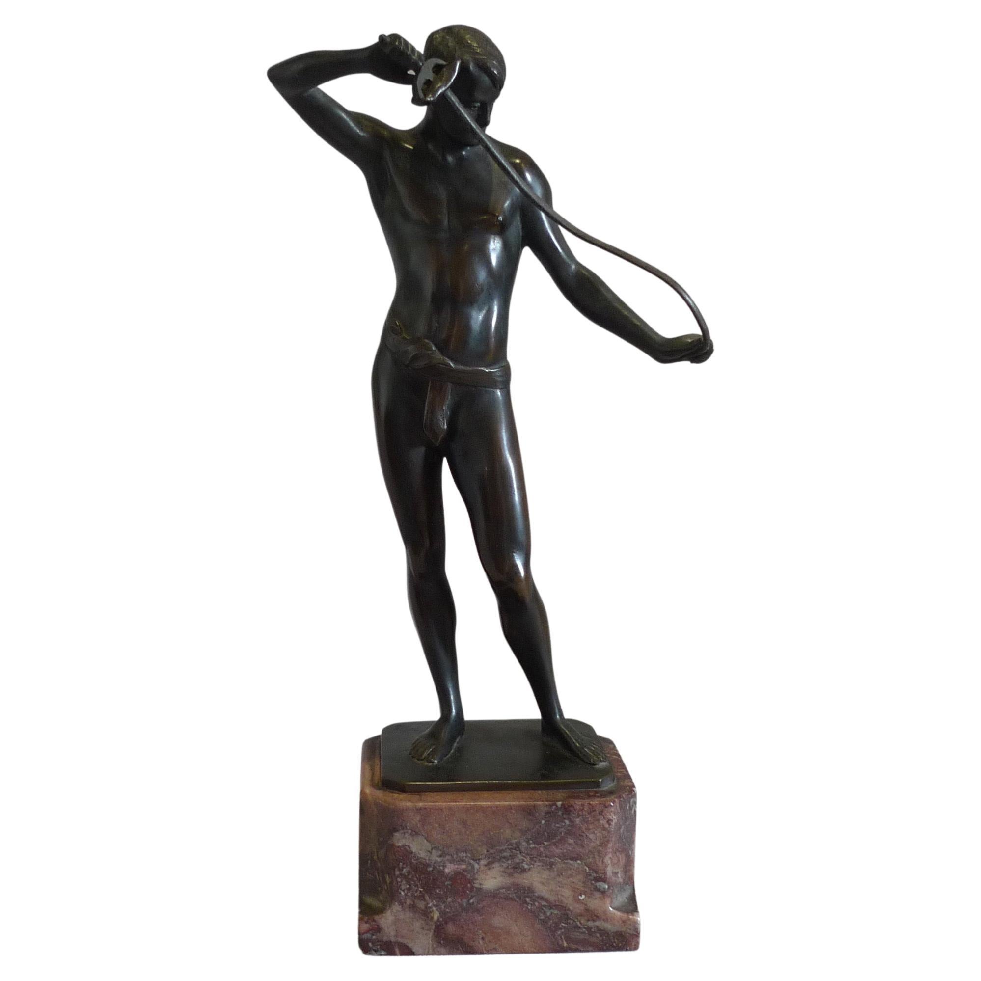 Art Deco bronze by Ludwif Eisenberger of man in a loin cloth with a rapier For Sale