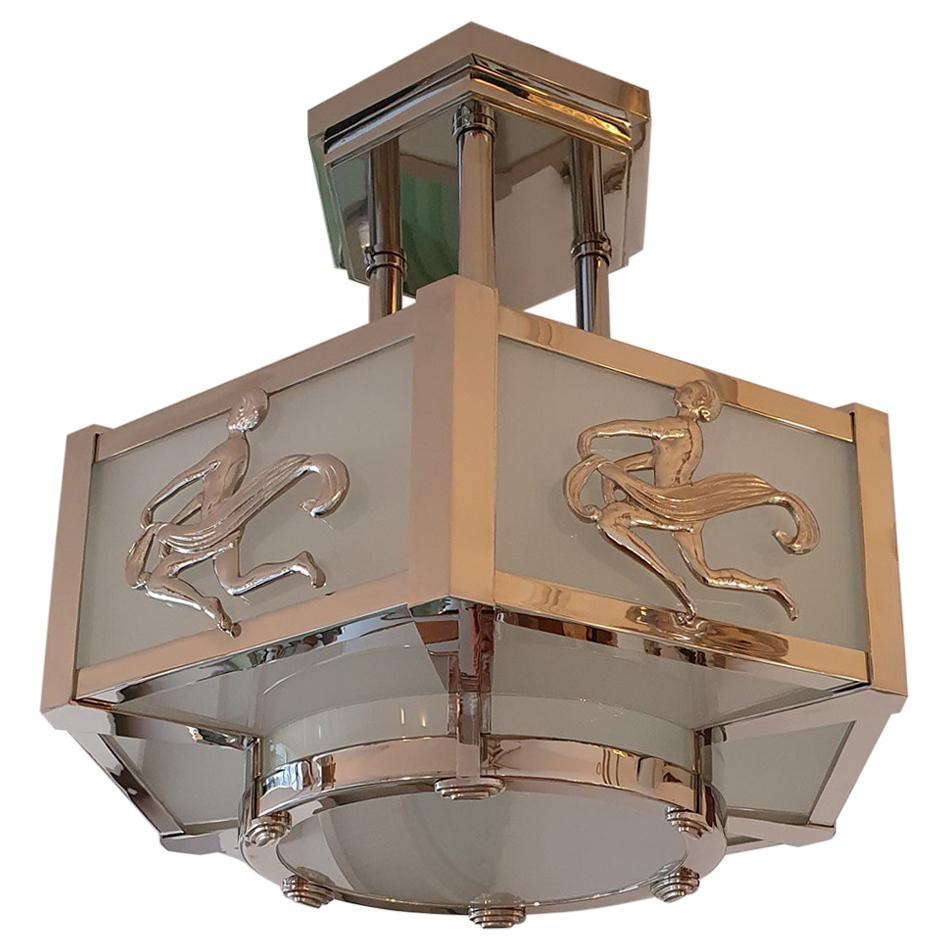 French Art Deco Bronze Chandelier in Modernism's style. For Sale