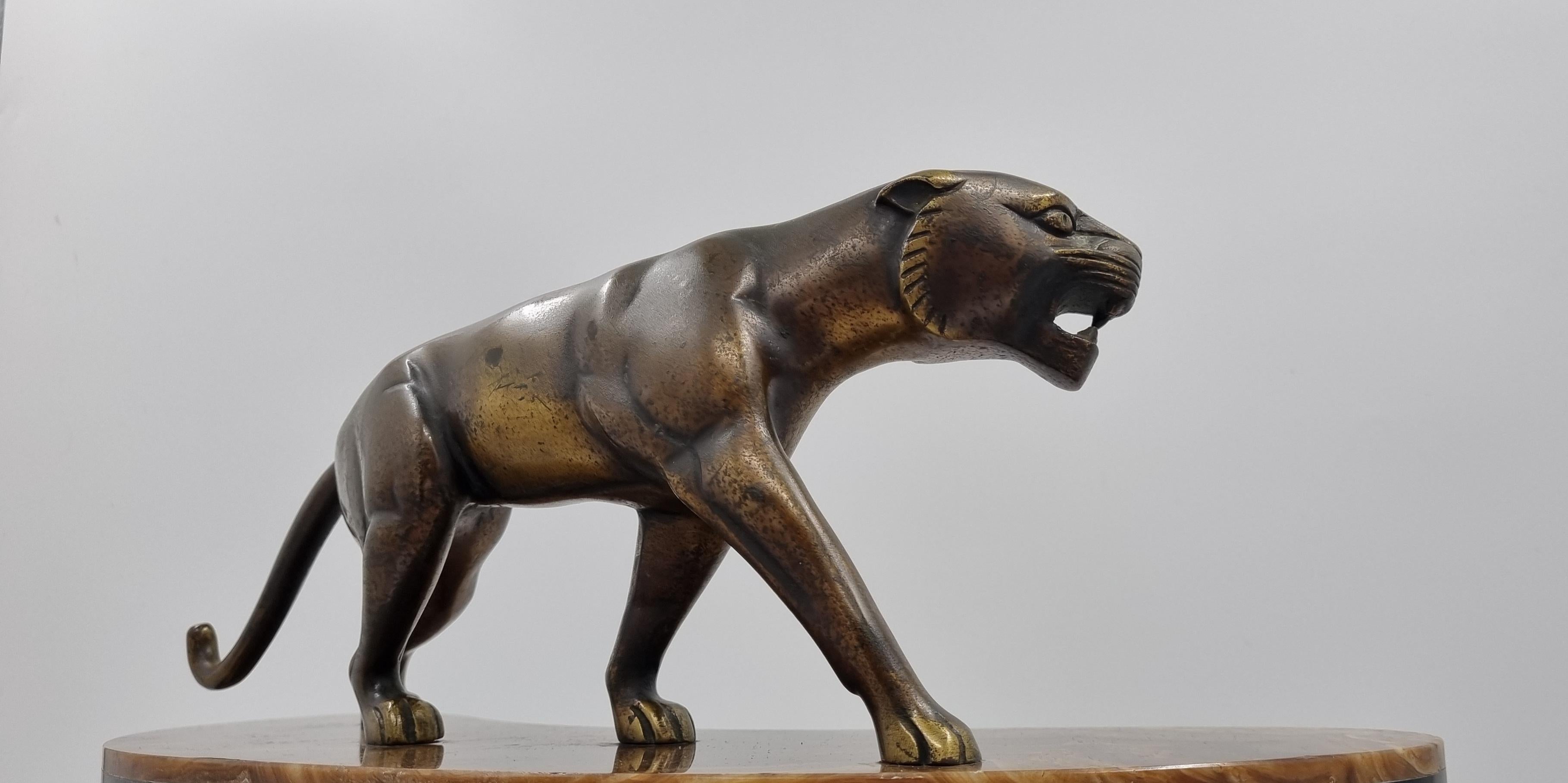 Early 20th Century Art Deco Bronze Clock Set with Panther by Hugues For Sale