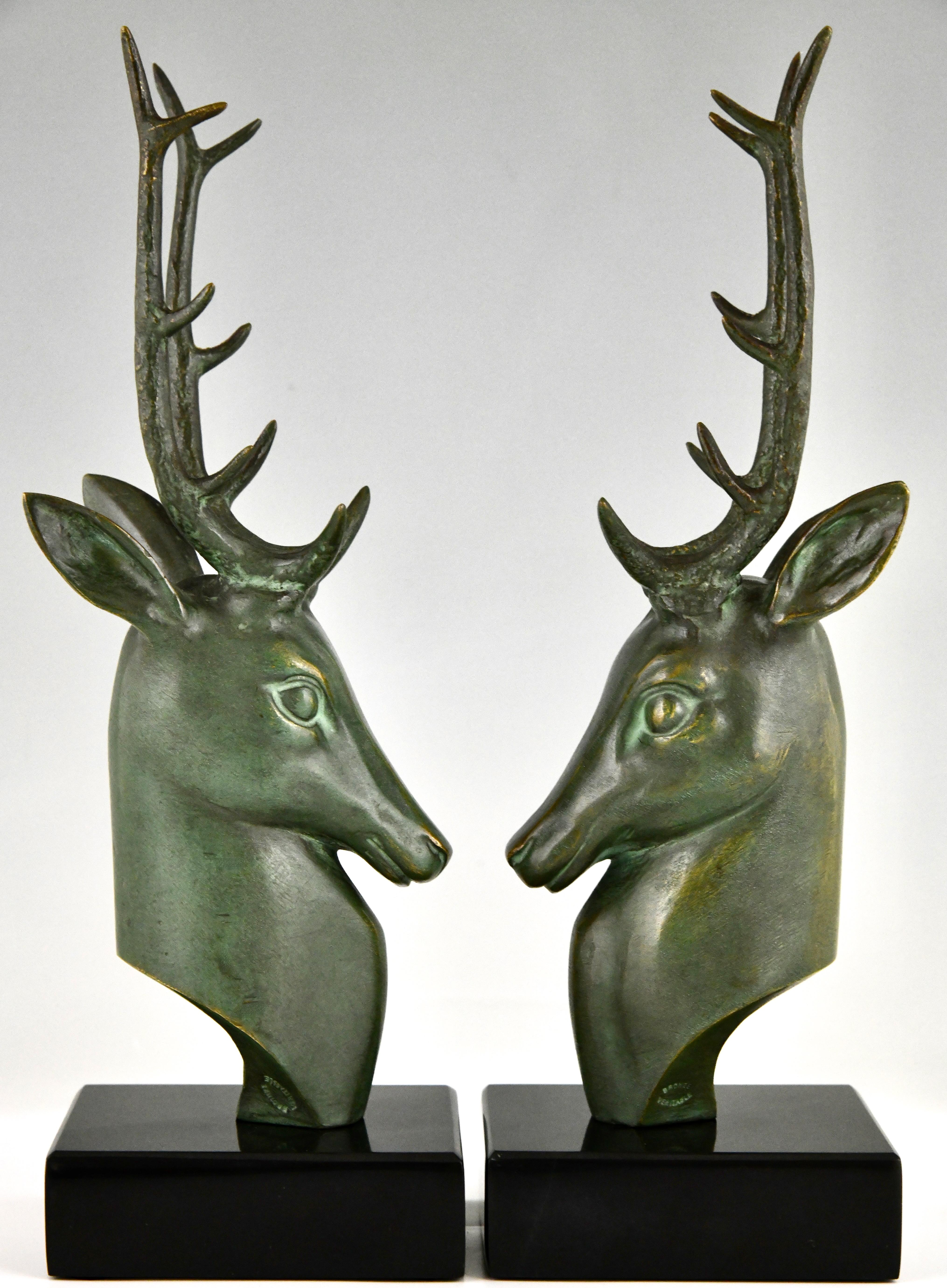 French Art Deco bronze deer bookends by Georges Raoul Garreau, 1930.  For Sale