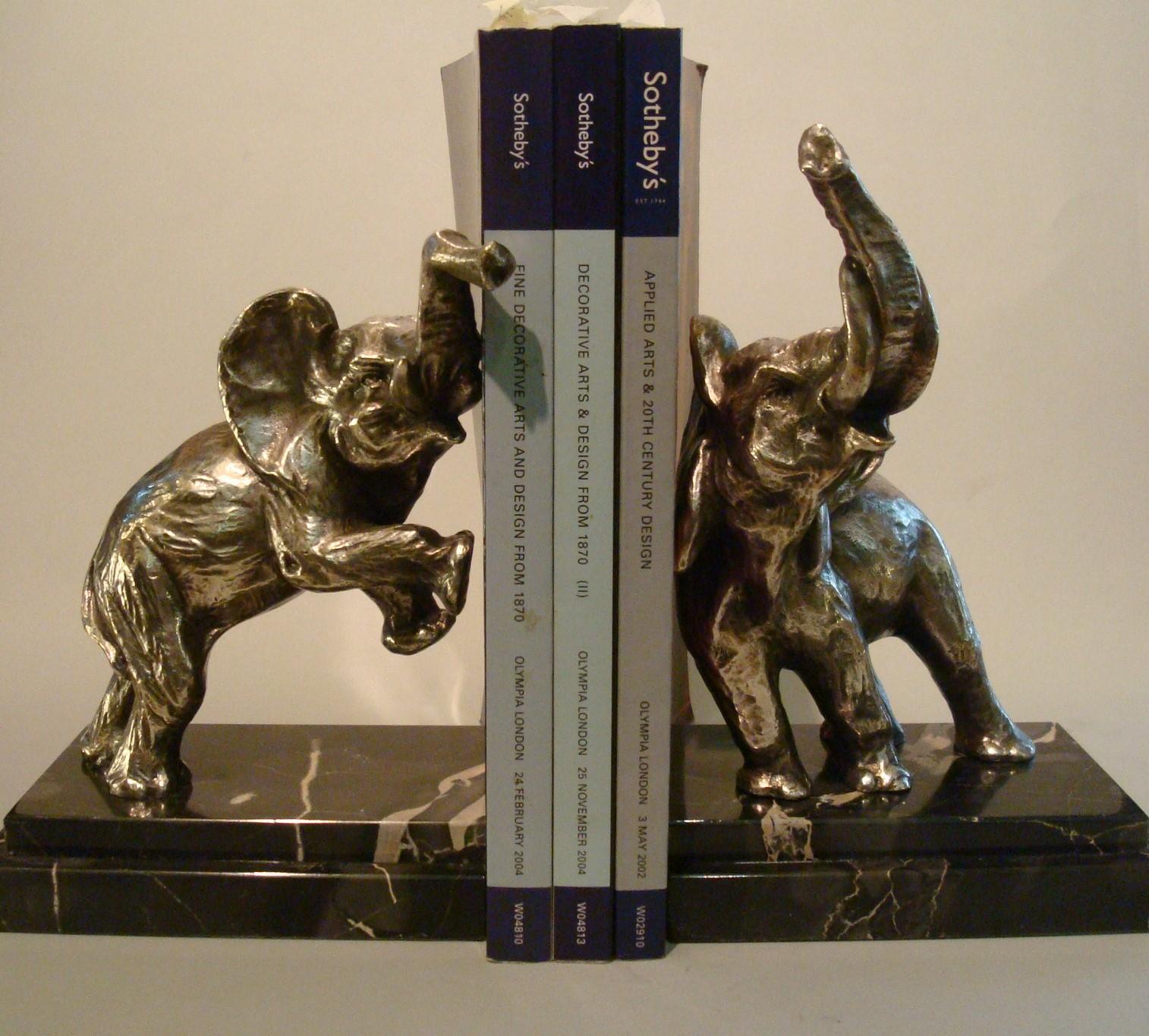 Art Deco bronze elephant bookends by Fontinelle
A pair of silvered bronze elephant bookends by Jean de la Fontinelle on portoro marble bases.
Jean de la Fontinelle (Designer).
  
  