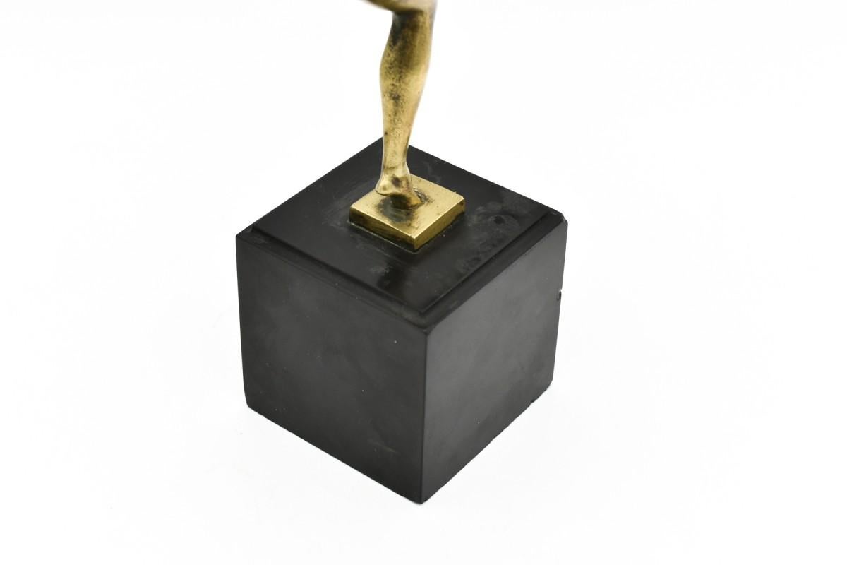 Bronze figure on a stone base. Designed by Alexandre-Joseph Derenne, artistic pseudonym of Marcel André Bouraine, in the 1930s. Classic Art Deco style. Very good condition, appropriate to the age of the sculpture.
Dimensions:
height: 27.5cm
width:
