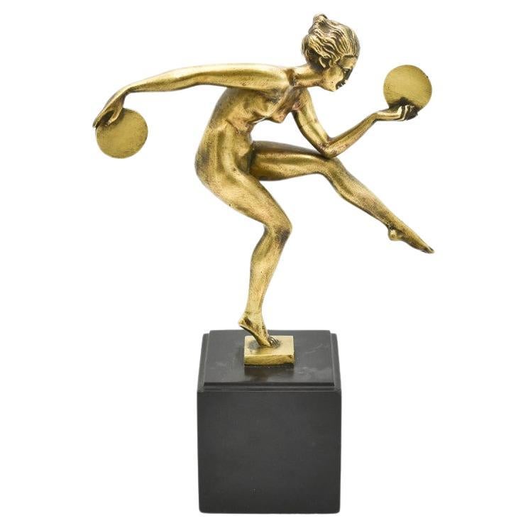 Art Deco bronze figure "Disc Dancer", Alexandre-Joseph Derenne, 1930. For Sale