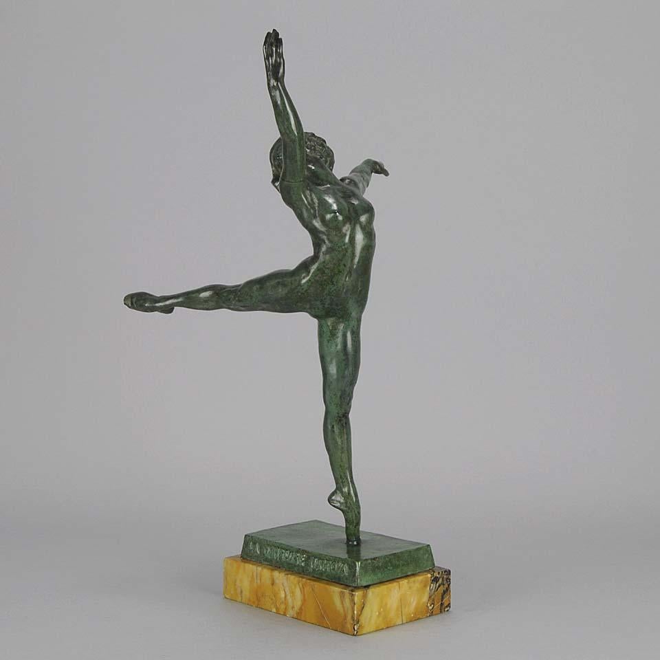 A very striking Art Deco bronze figure of the dancer Nattova in stretched ballet pose, the elegant line further emphasised by her naked body. The bronze patinaed with a deep, rich brown colour, the surface chased with fine detail and finished on a