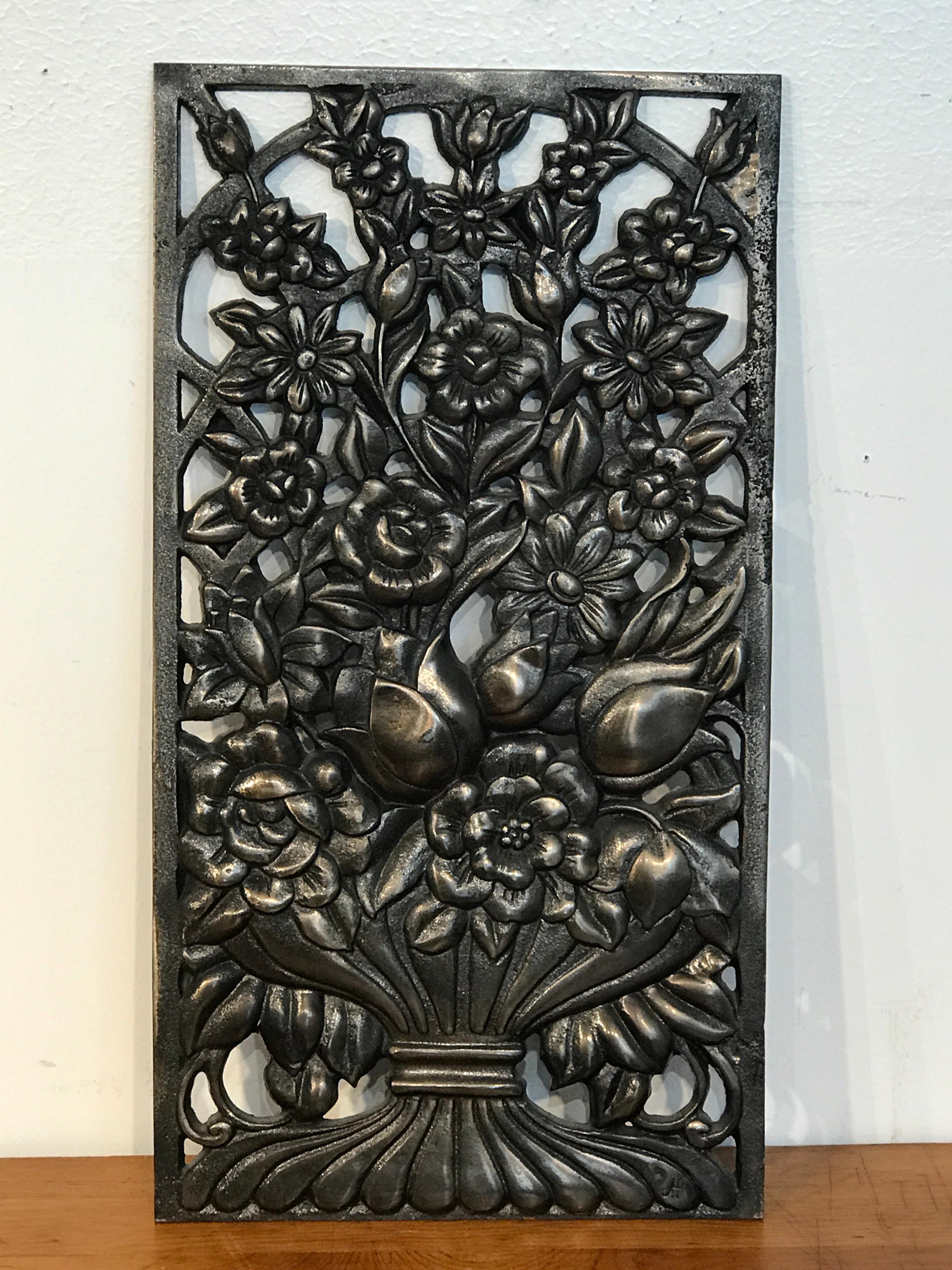 Art Deco bronze floral motif architectural panel, four available, each one of rectangular form with pierced floral still life.
