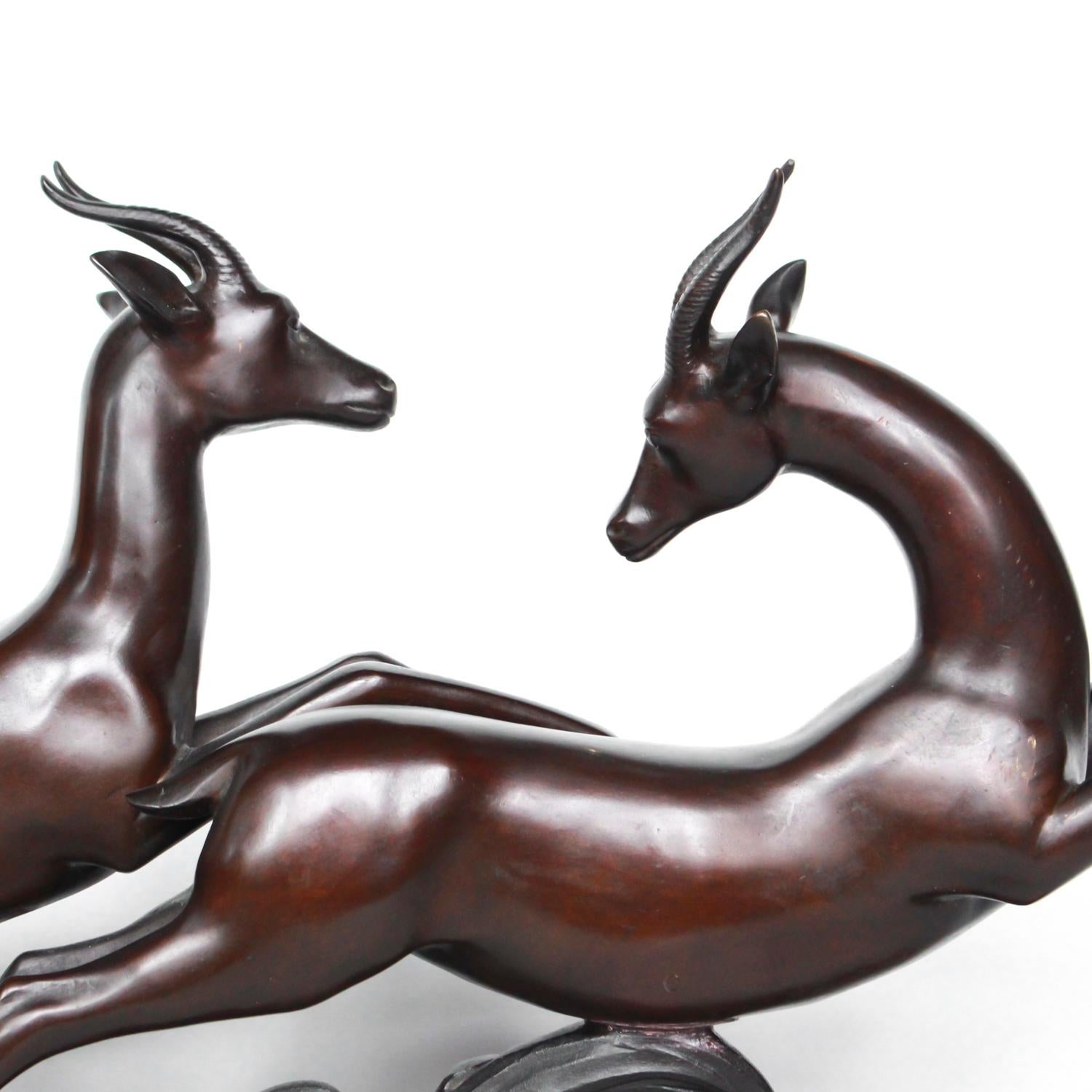 An Art Deco bronze sculpture of a pair of running gazelles by Lucien Charles Alliot (1877-1967). Set in a naturalistic base over a marble plinth. 

Signed L Alliot to bronze.

Artist: Lucien Charles Alliot (1877-1967).
 
Dimensions: H 41cm, W
