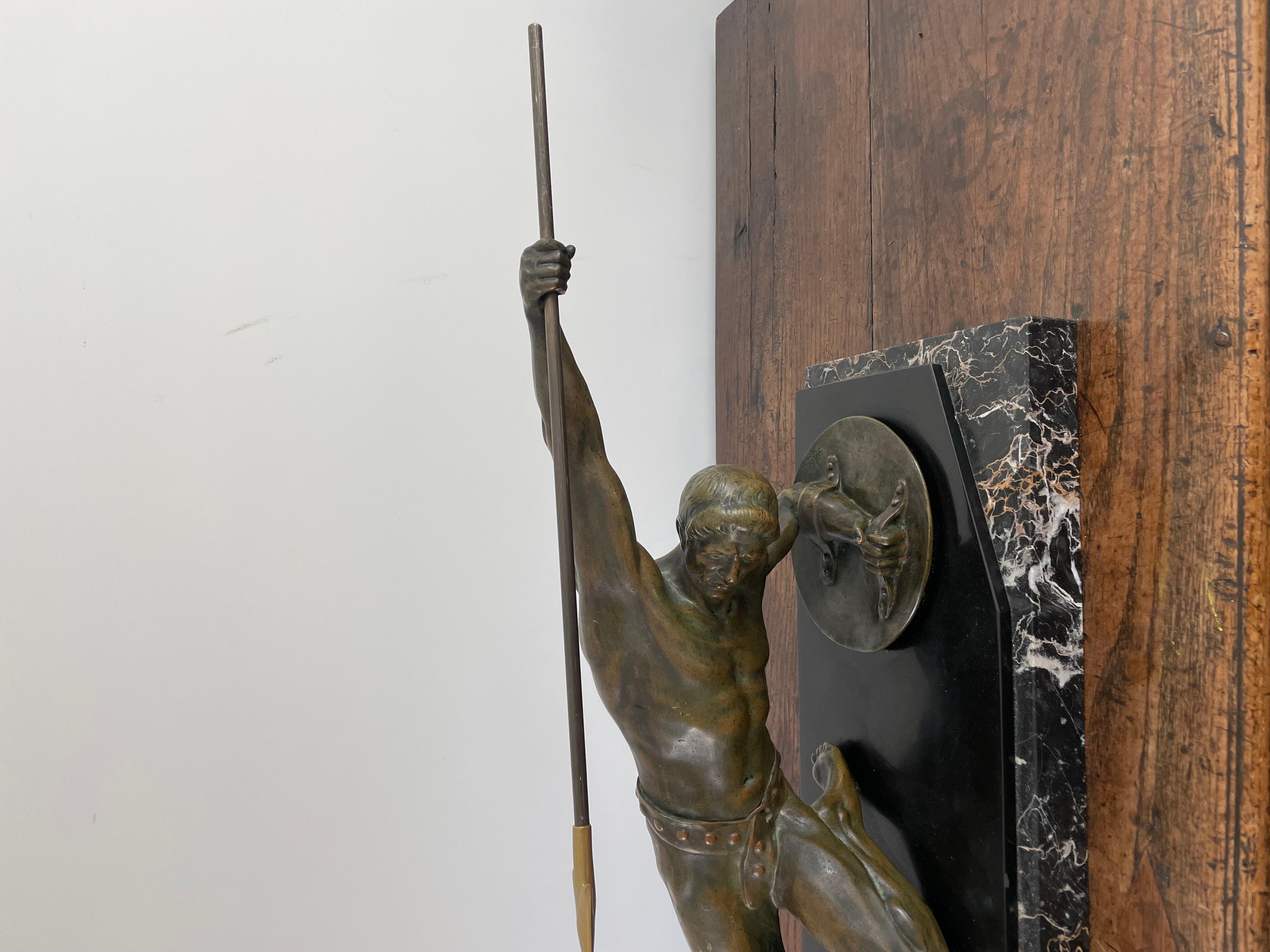Stunning Art Deco bronze sculpture of a gladiator with spear and shield
Circa 1925 signed Desire Grisard , bronze
Mounted on black Belgian slate base and veined black marble
L. 86 cm. x H. 37 cm x W. 23.5 cm.
L. 33.9 inch x H. 14.6 inch x W. 9.3
