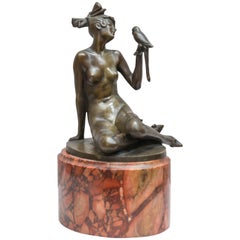 Art Deco Bronze Group of a Nude Woman Holding a Parrot, Red Marble Base