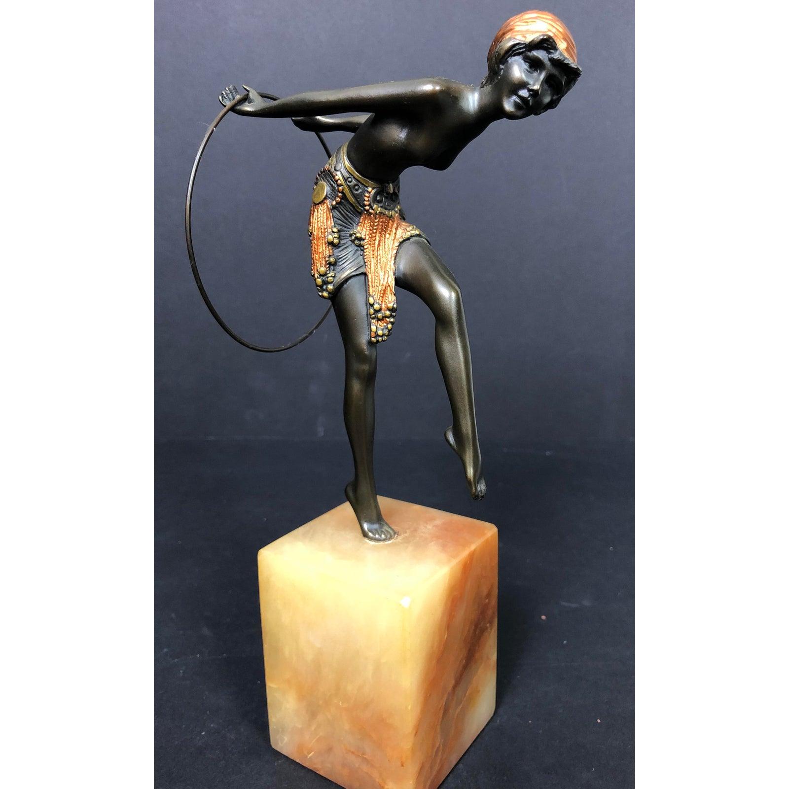 Art Deco Bronze Hoop Dancer. Beautiful quality Art Deco hoop dancer in a multi-tone patina mounted on an onyx or alabaster base.  