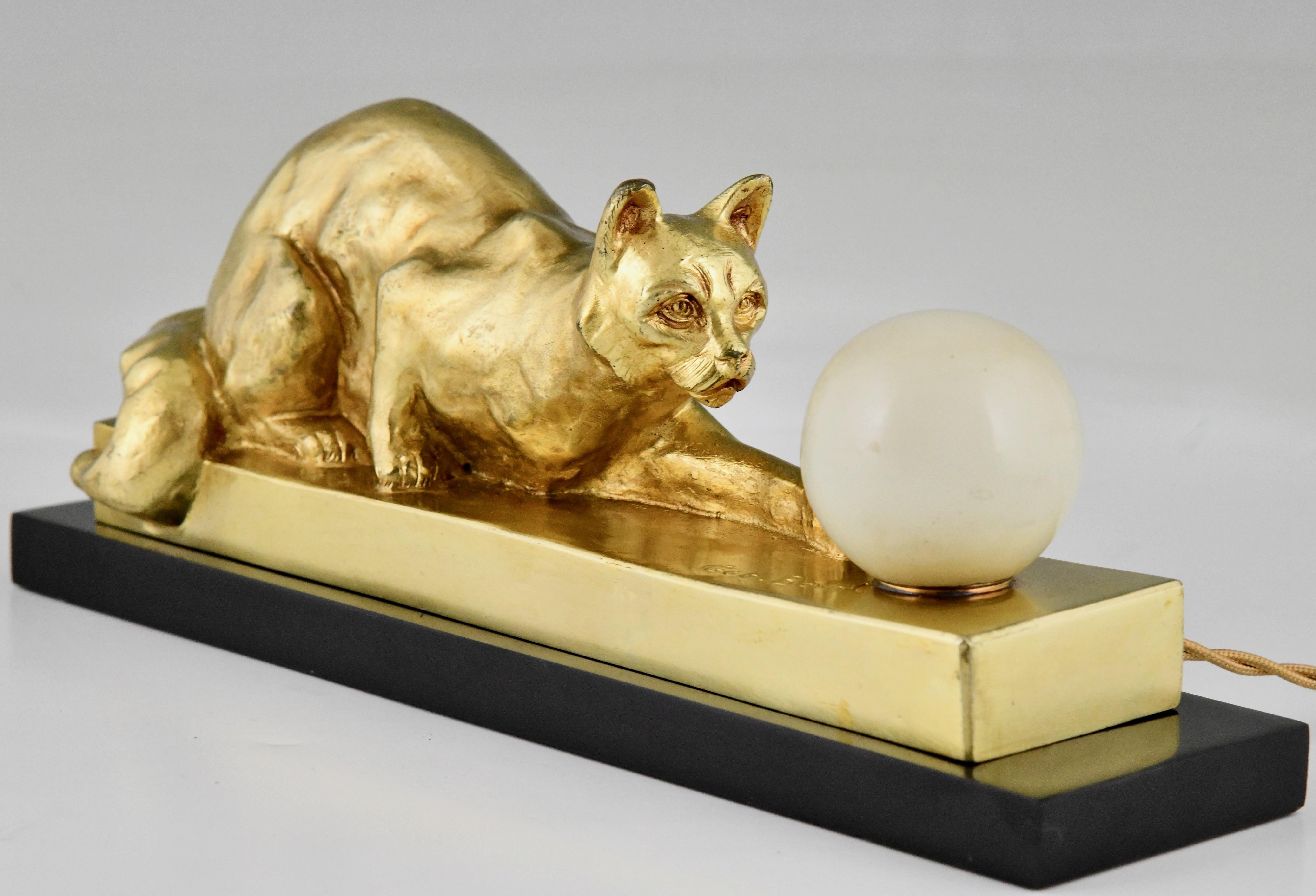 French Art Deco bronze lamp sculpture cat with ball by Georges Benoit.