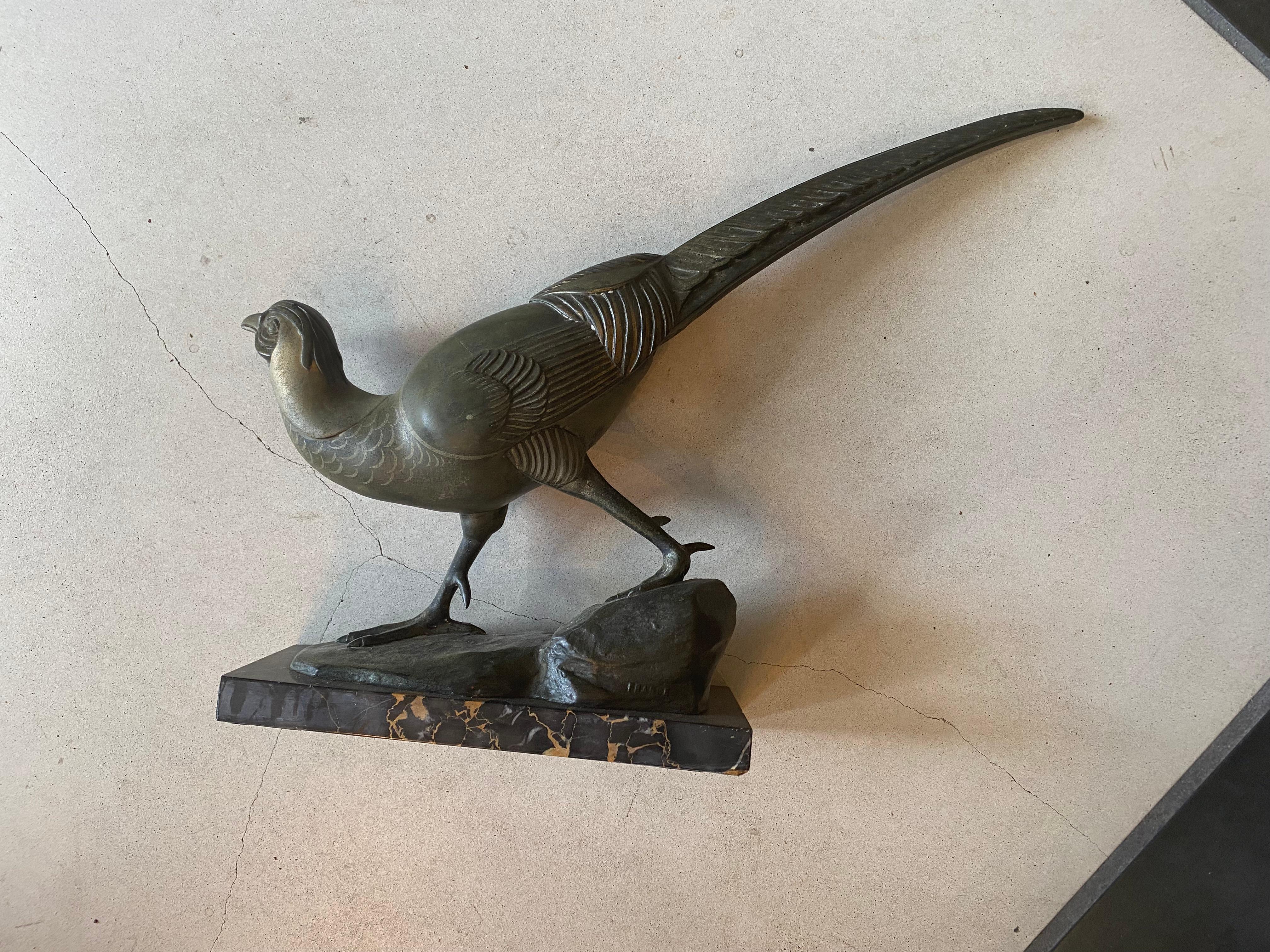This Large PHEASANT in Bronze on marble stand was sculpted by French artist
Ree'nee' Rochard (1906-1984)  during the Art Deco Period  signed in the bronze 