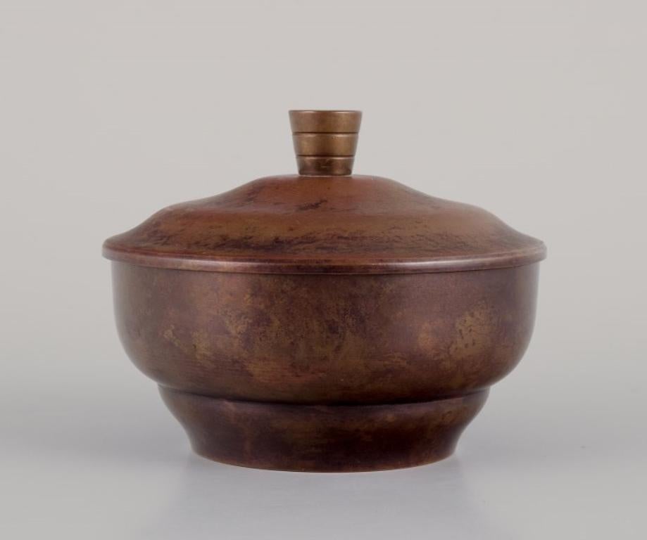 Scandinavian Art Deco bronze lidded jar in the style of Just Andersen. For Sale