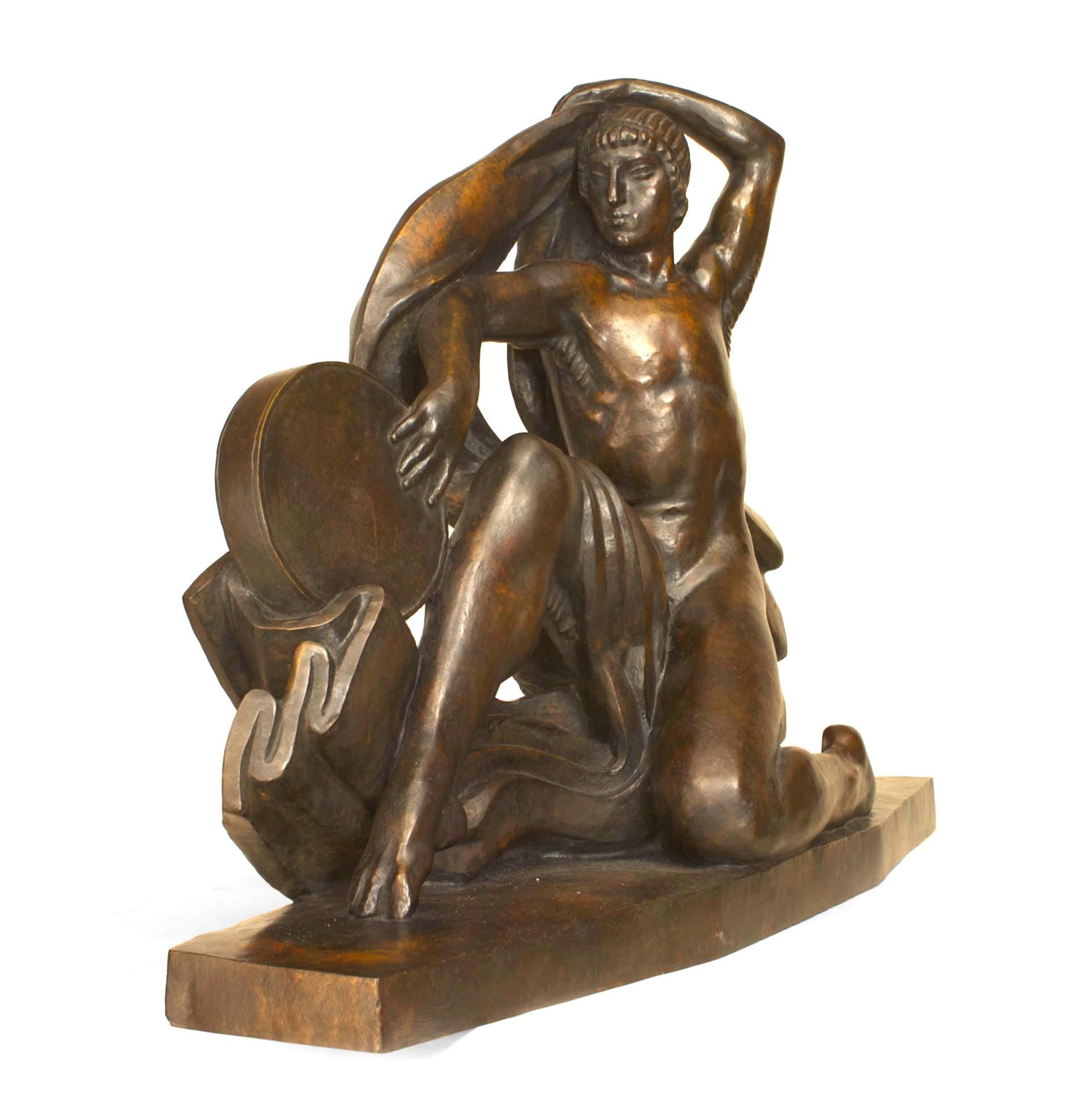 French Art Deco bronze sculpture of a figure on bent knee holding a tambourine and a flowing drape (signed: MARCEL RENARD 1925, titled: 