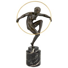 Danseur nu de cerceau en bronze Art déco André Marcel Bouraine:: 1930:: France