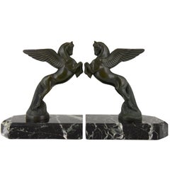 Buchstützen aus Bronze mit Pagasus-Pferd im Art déco-Stil Maurice Frecourt  Frankreich  1930