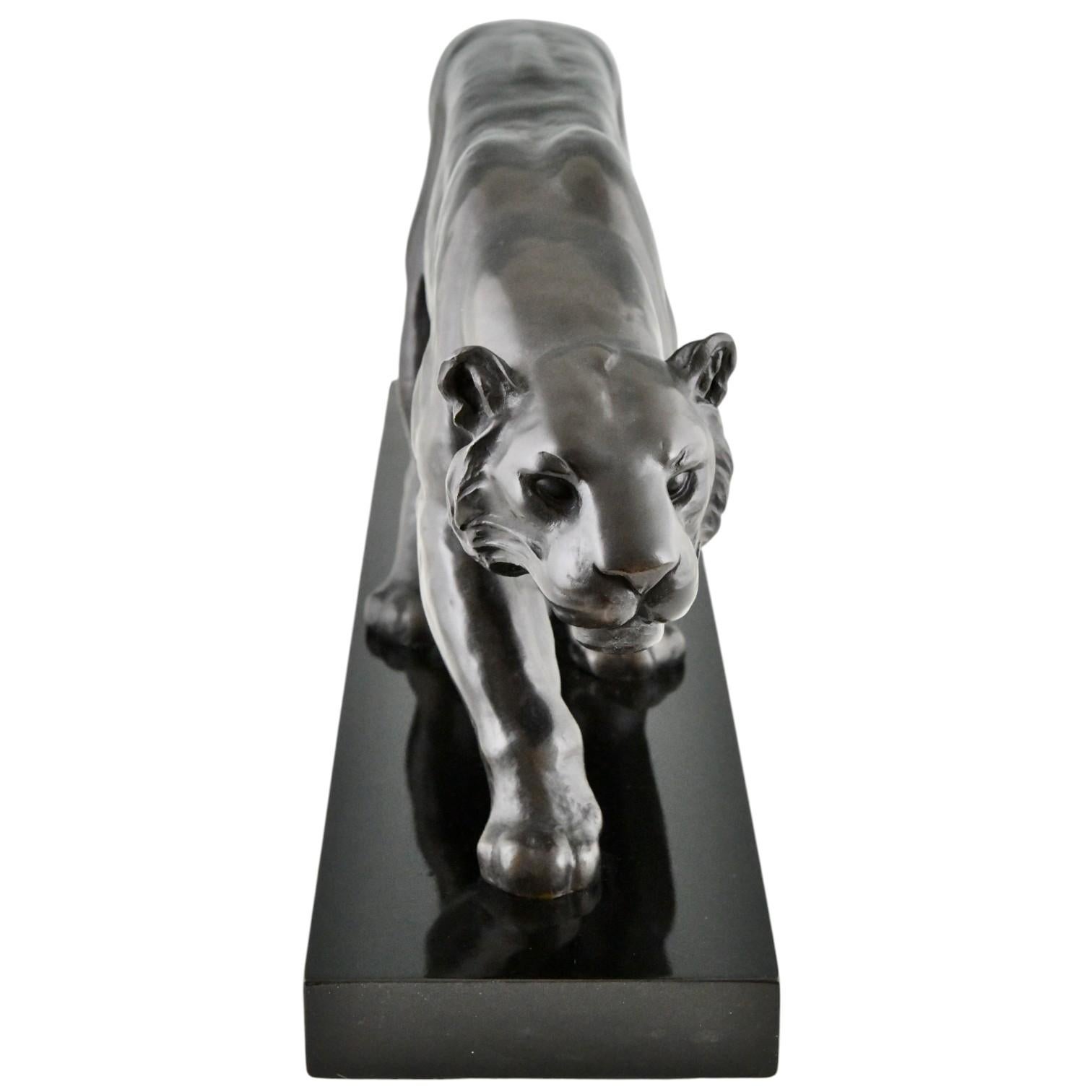 Patinated Art Deco Bronze Panther Sculpture Alexandre Ouline Black patina France, 1930 For Sale