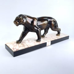 Panthère en métal patiné Art déco, sculpture avec base en marbre, années 1930