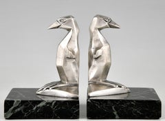 Serre-livres Art Déco pingouin en bronze Gaston H Bourcart France 1930