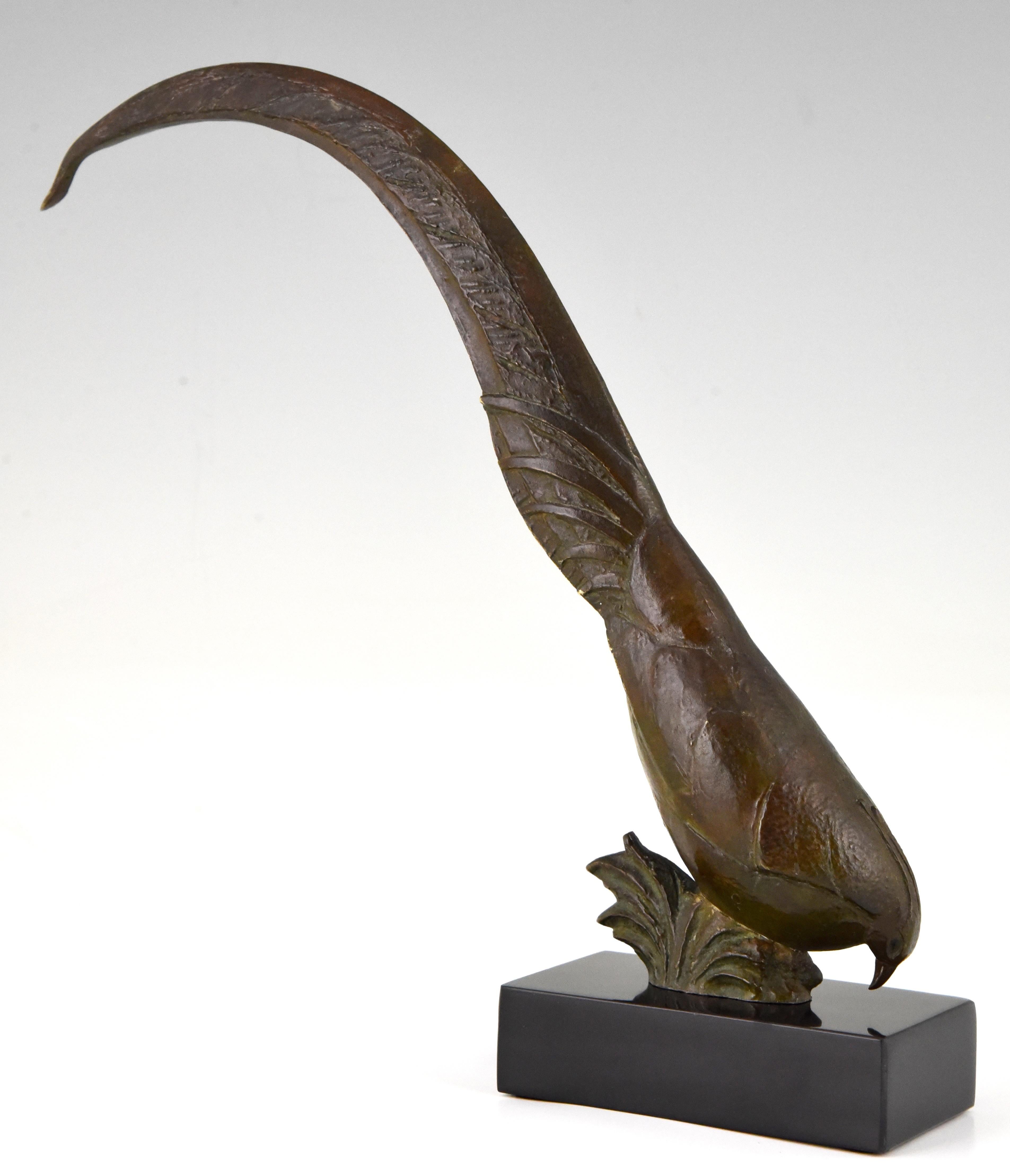 Art Deco bronze sculpture of a Golden Pheasant with long tail feathers by the French animal sculptor Andre Vincent Becquerel, beautiful patina and mounted on a Belgian Black marble base, circa 1925.

“Animals in bronze” by Christopher Payne.