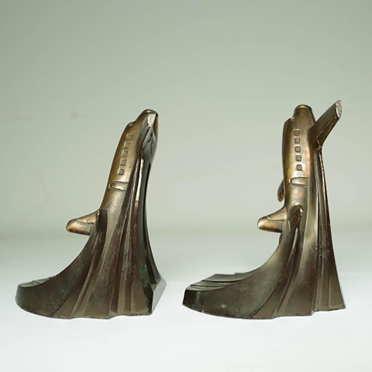 ABOUT

This is an original pair of Art Deco style cast gray or 